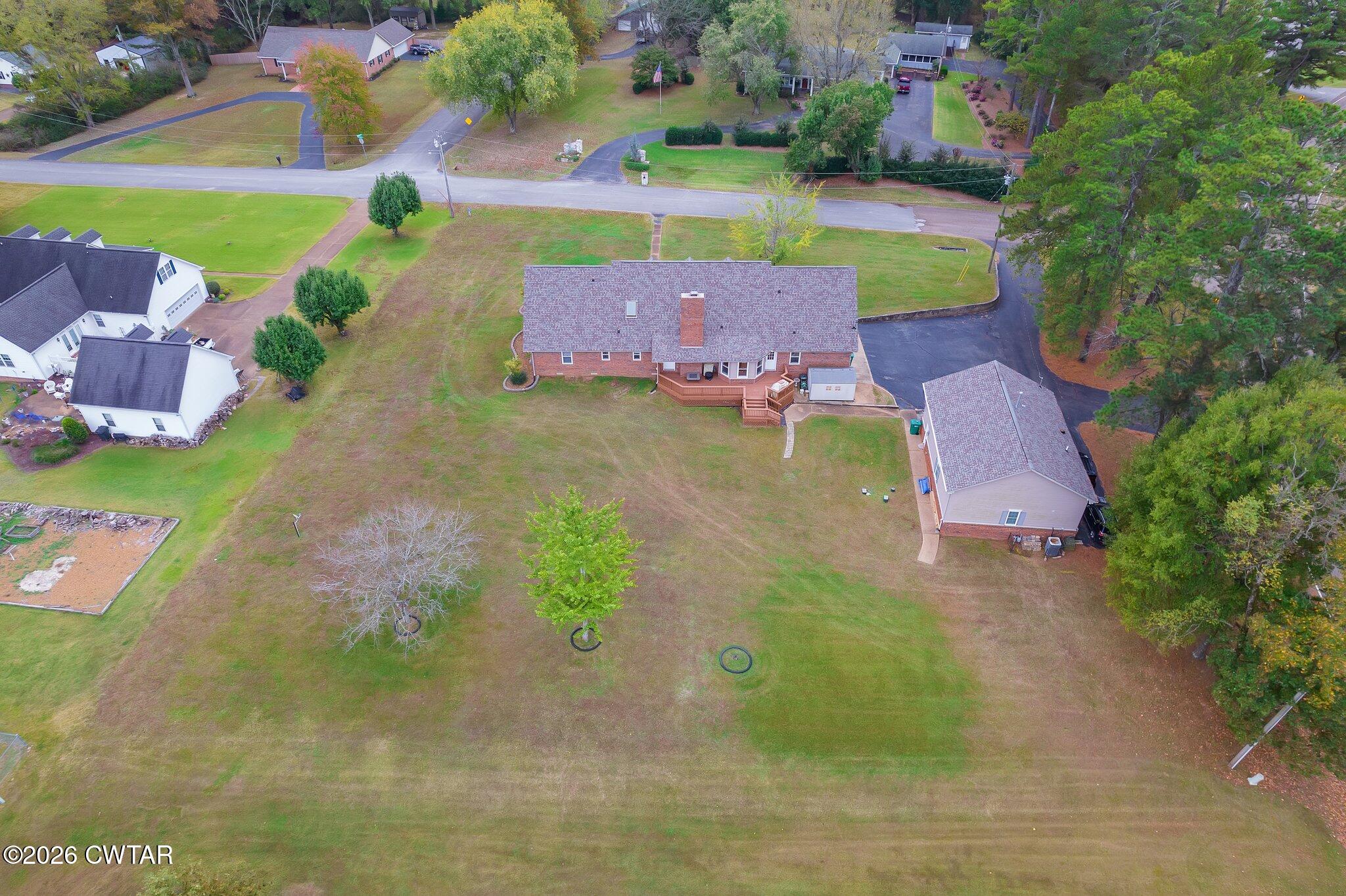 812 Pipkin Road Jackson, TN 38305 - Photo 58 of 62 an aerial view of a house with a yard