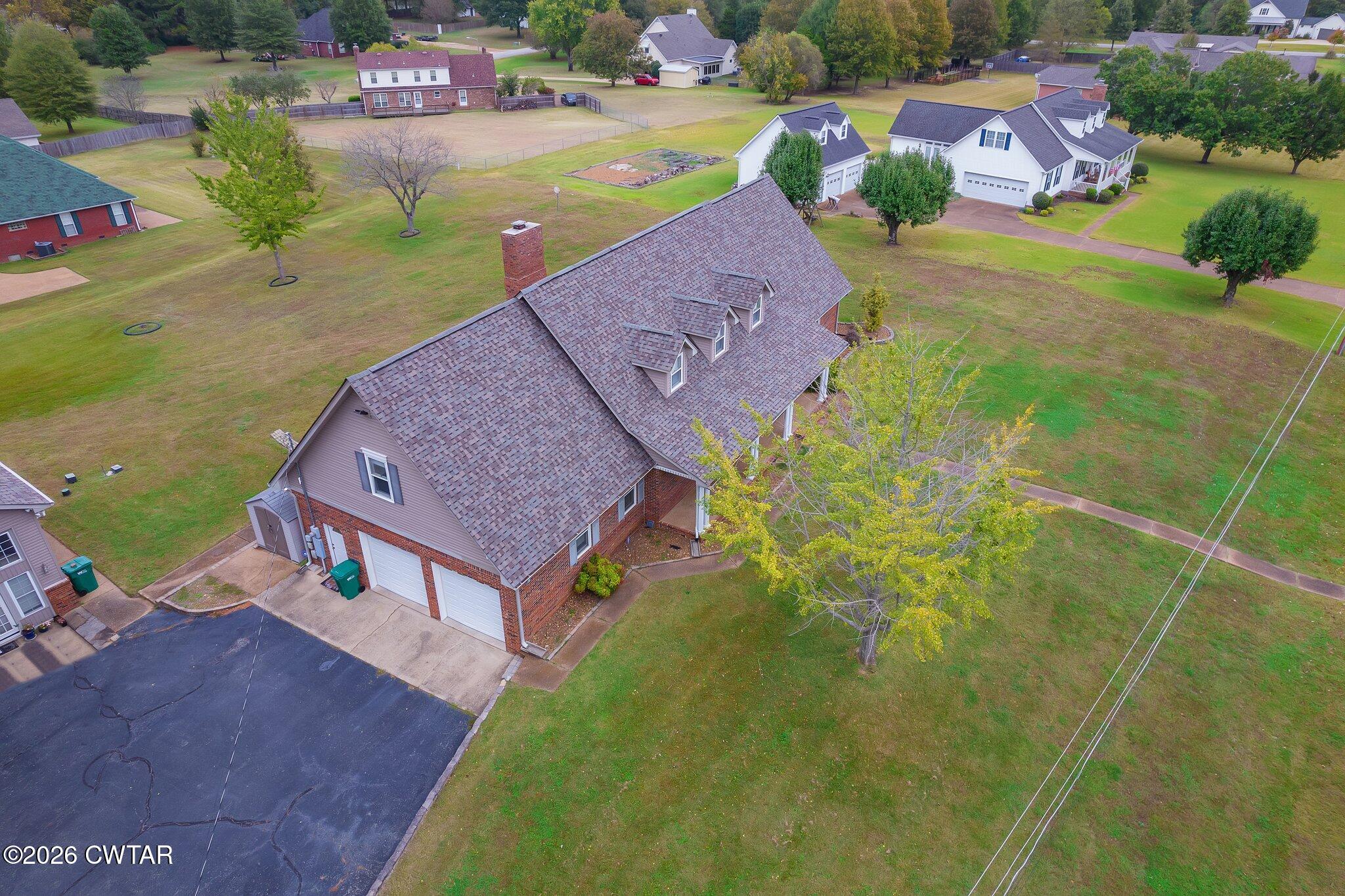 812 Pipkin Road Jackson, TN 38305 - Photo 62 of 62 an aerial view of a house with garden space and street view