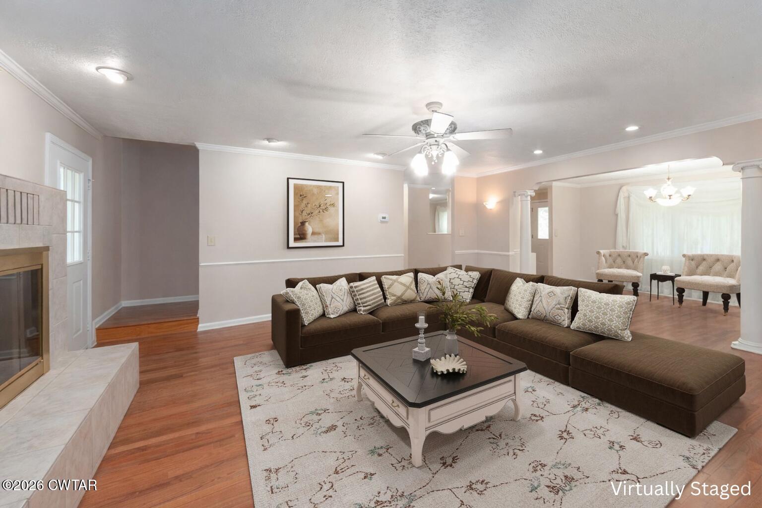 812 Pipkin Road Jackson, TN 38305 - Photo 10 of 62 a living room with furniture and a chandelier