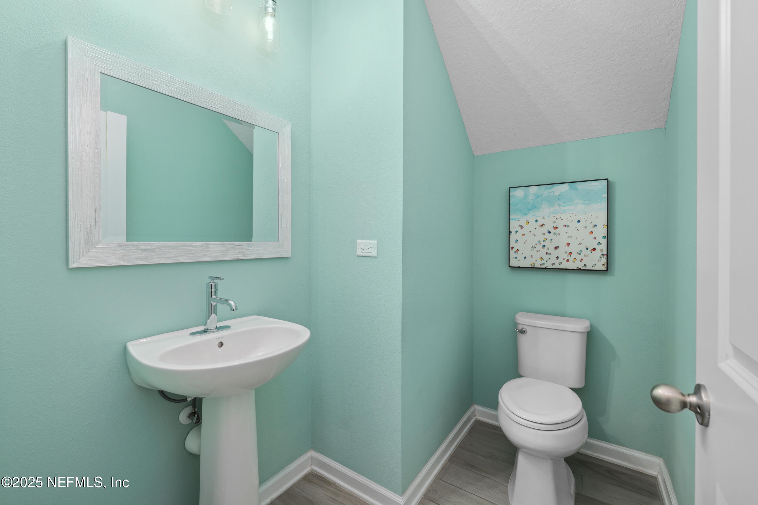 58 Strobe Court St. Augustine, FL 32095 - Photo 16 of 50 a bathroom with a toilet sink and mirror