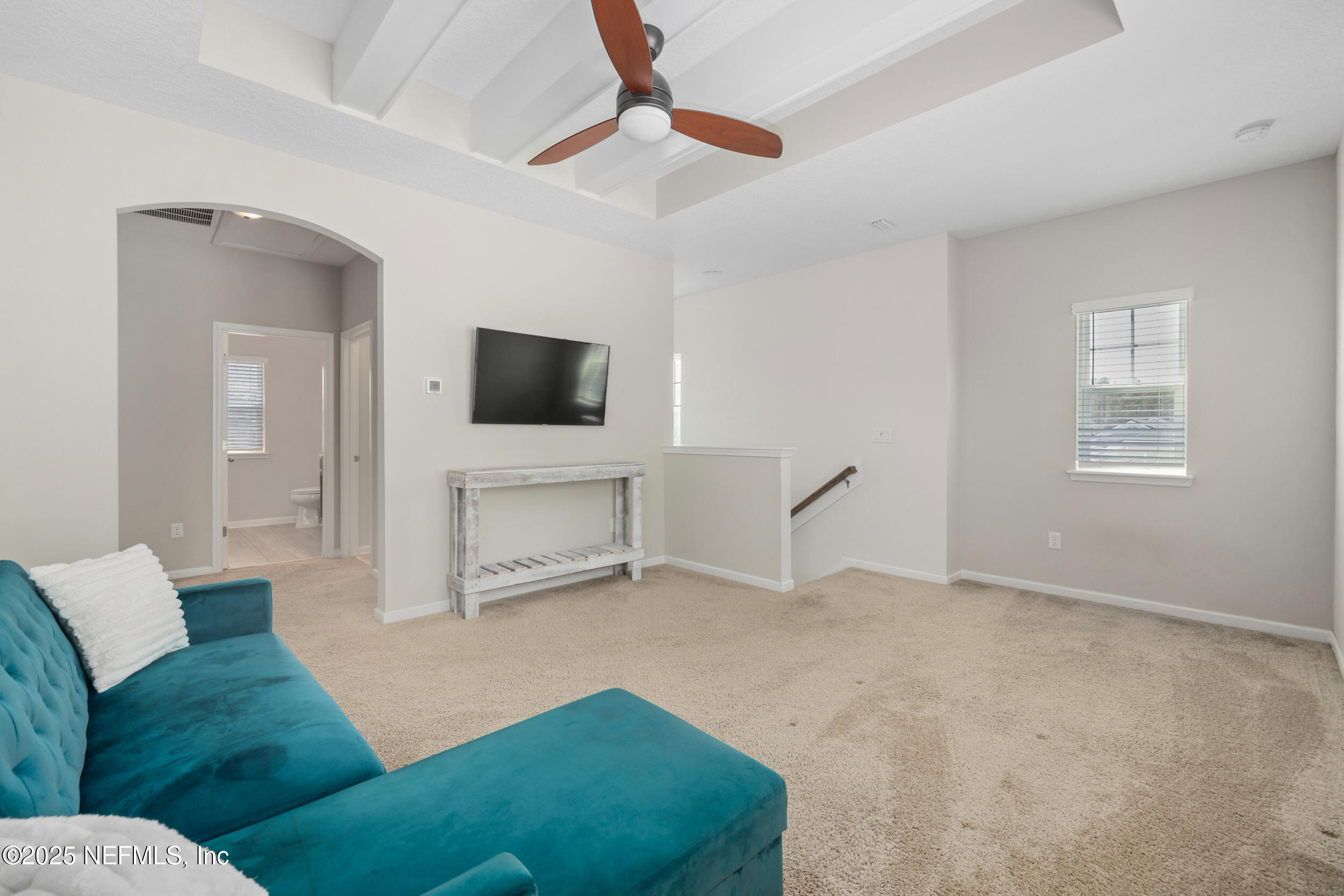 58 Strobe Court St. Augustine, FL 32095 - Photo 22 of 50 a living room with furniture and a flat screen tv
