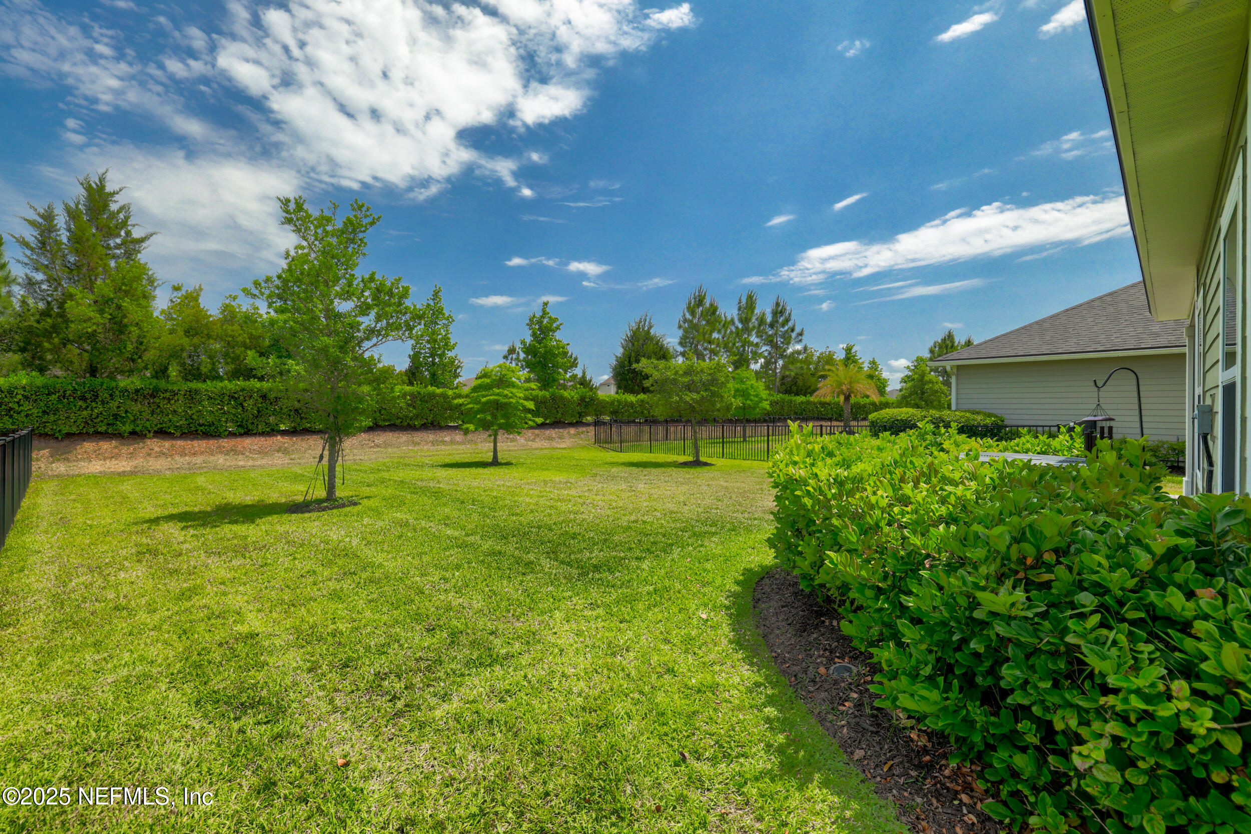 58 Strobe Court St. Augustine, FL 32095 - Photo 32 of 50 a view of a golf course with a lake