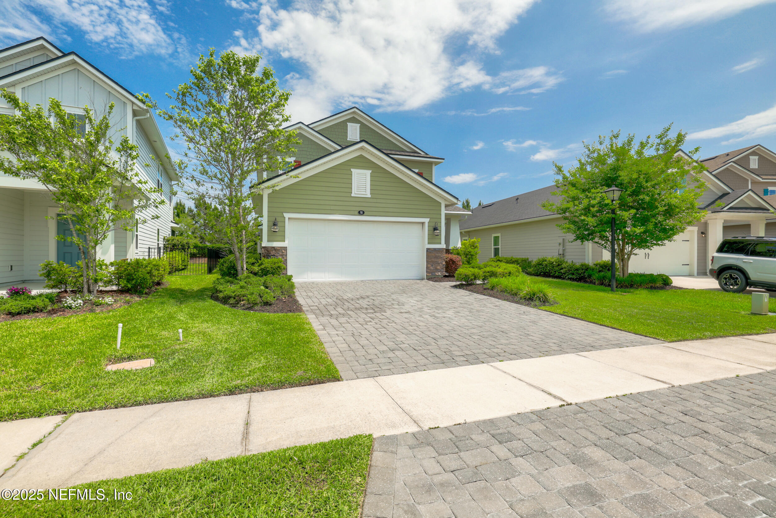 58 Strobe Court St. Augustine, FL 32095 - Photo 36 of 50 a front view of house with yard and green space