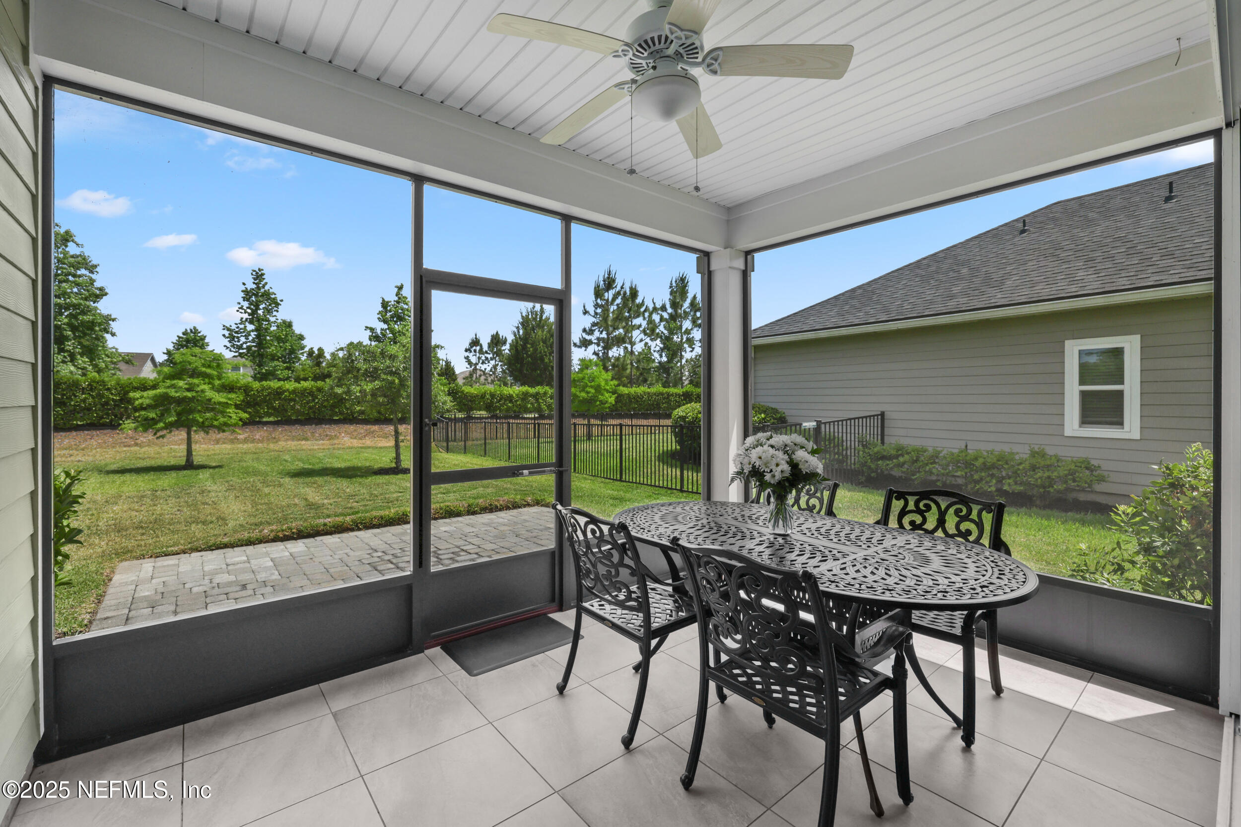 58 Strobe Court St. Augustine, FL 32095 - Photo 5 of 50 a view of a patio with a table chairs and a table
