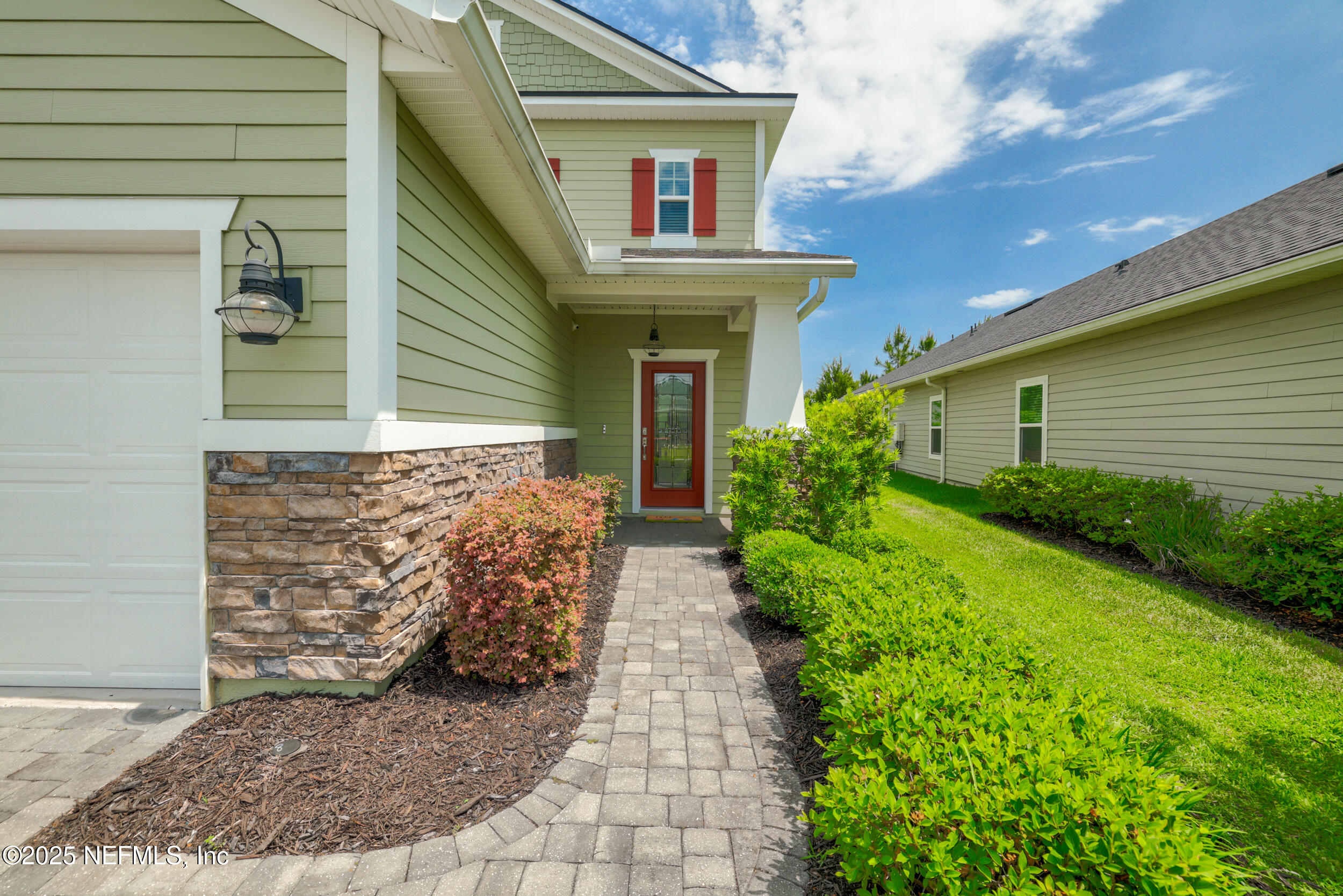 58 Strobe Court St. Augustine, FL 32095 - Photo 6 of 50 a front view of a house with garden
