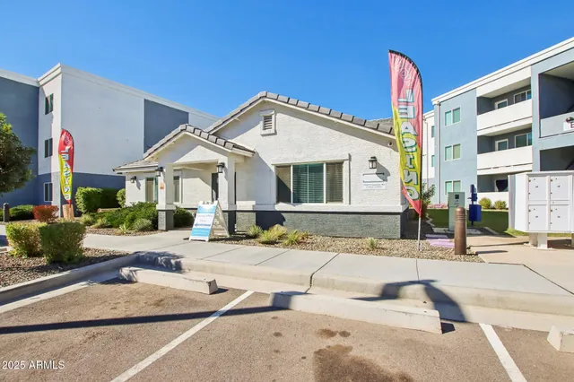 a front view of a house with a patio