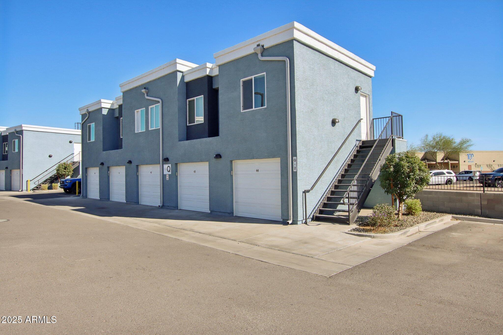 12925 West Greenway Road, Unit 5 El Mirage, AZ 85335 - Photo 15 of 30 a view of a house with backyard