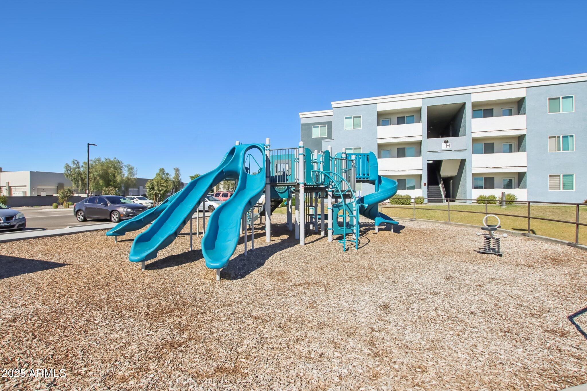 12925 West Greenway Road, Unit 5 El Mirage, AZ 85335 - Photo 25 of 30 a view of a park with slide