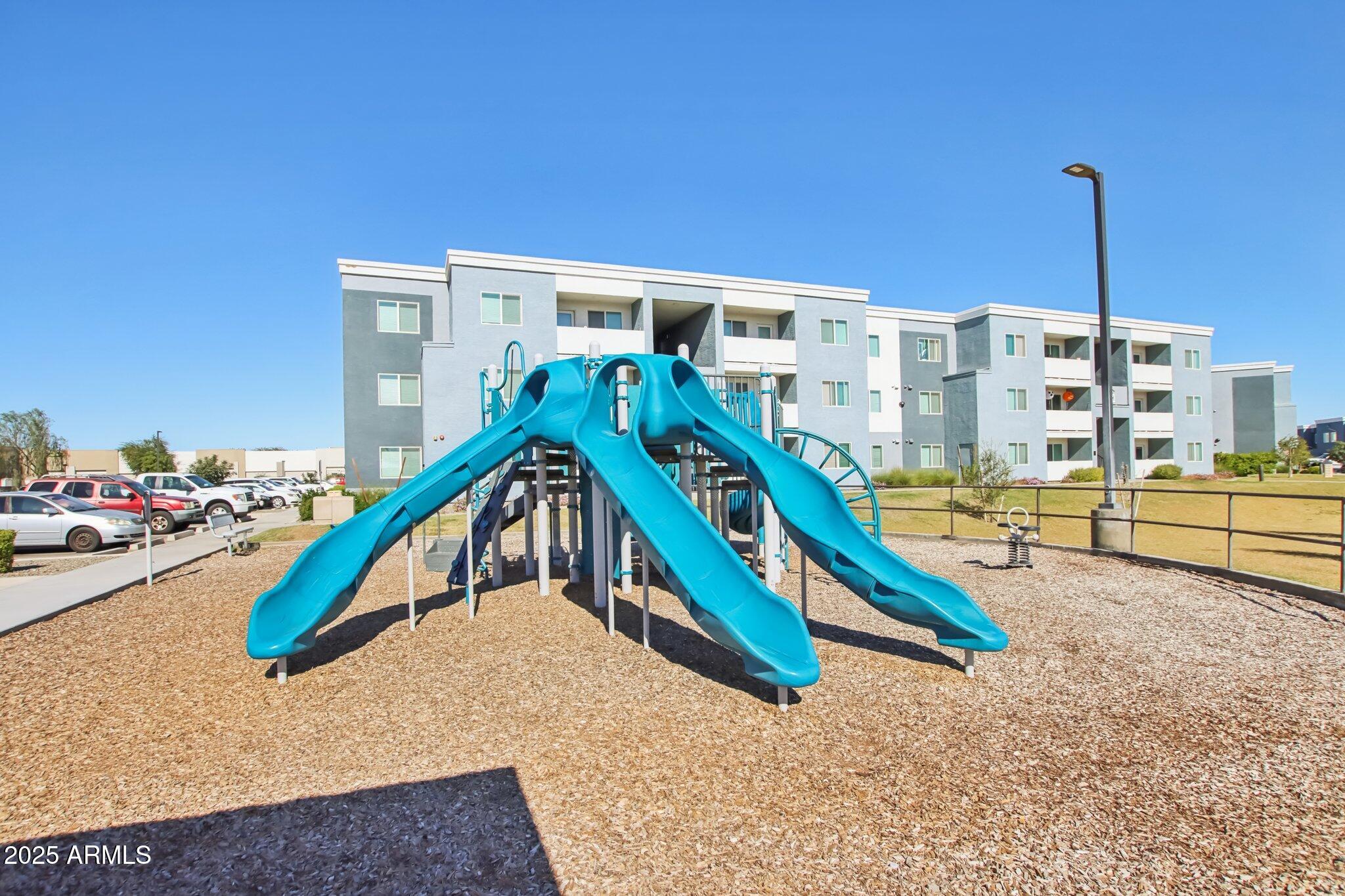12925 West Greenway Road, Unit 5 El Mirage, AZ 85335 - Photo 30 of 30 a view of a slide with a slide