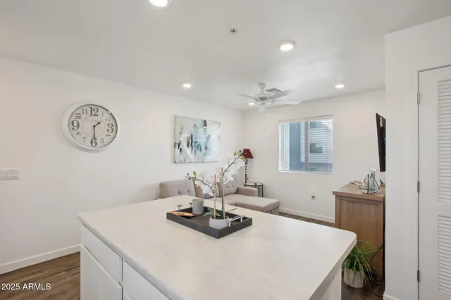 a view of a dining room with furniture and a table