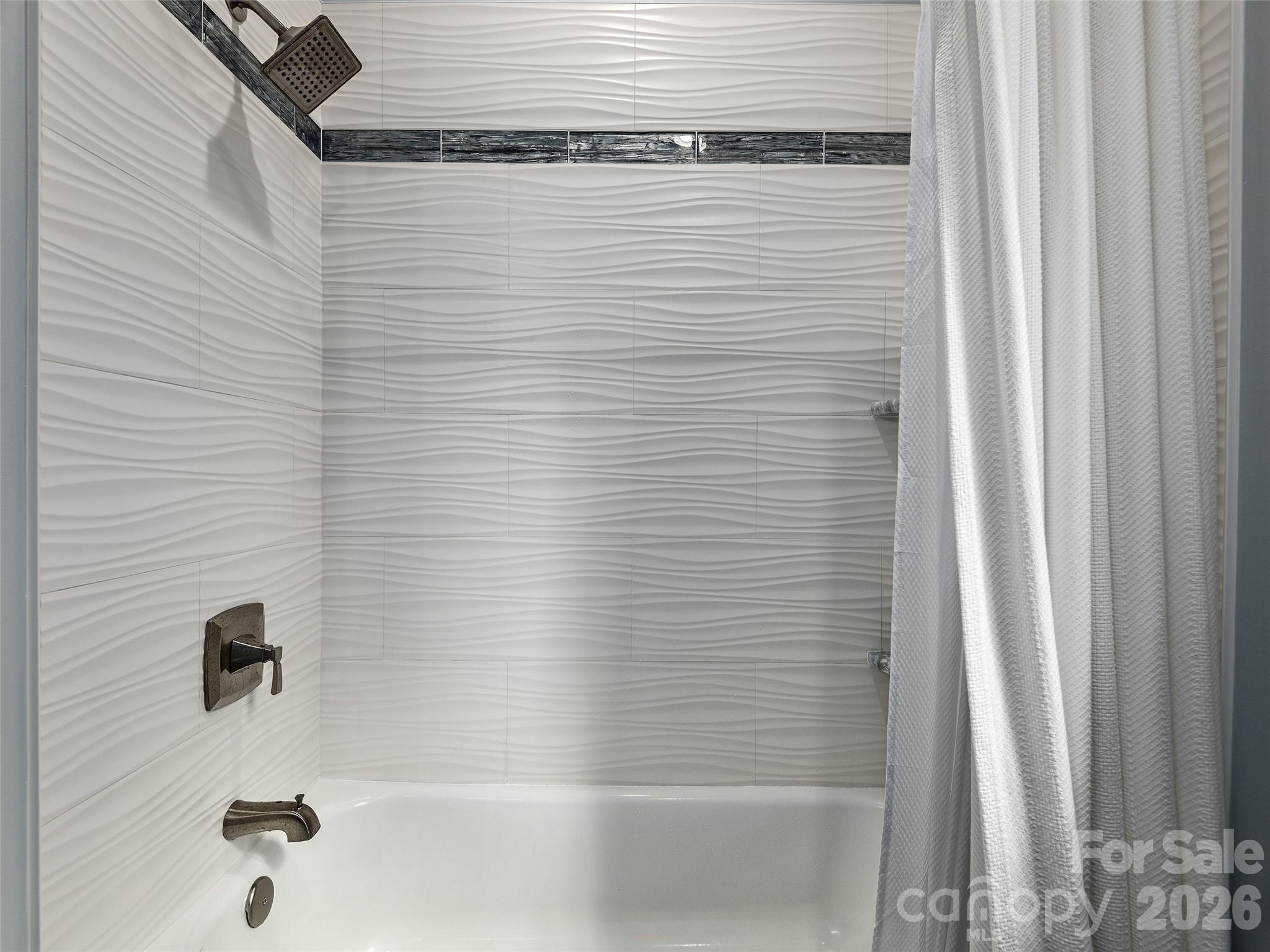 3244 Lake Adger Parkway Mill Spring, NC 28756 - Photo 28 of 44 a bathroom with a shower