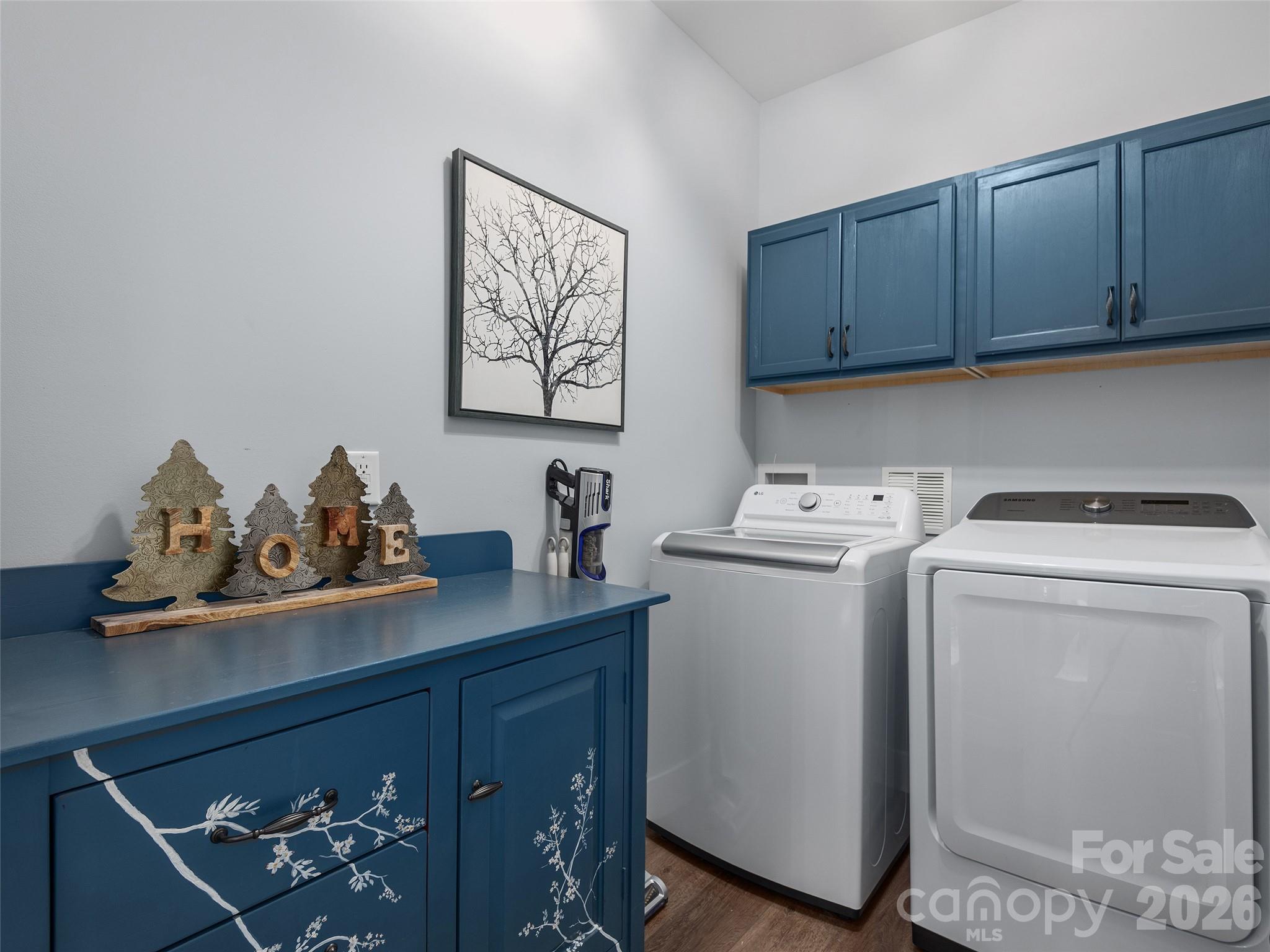 3244 Lake Adger Parkway Mill Spring, NC 28756 - Photo 31 of 44 a utility room with dryer and washer