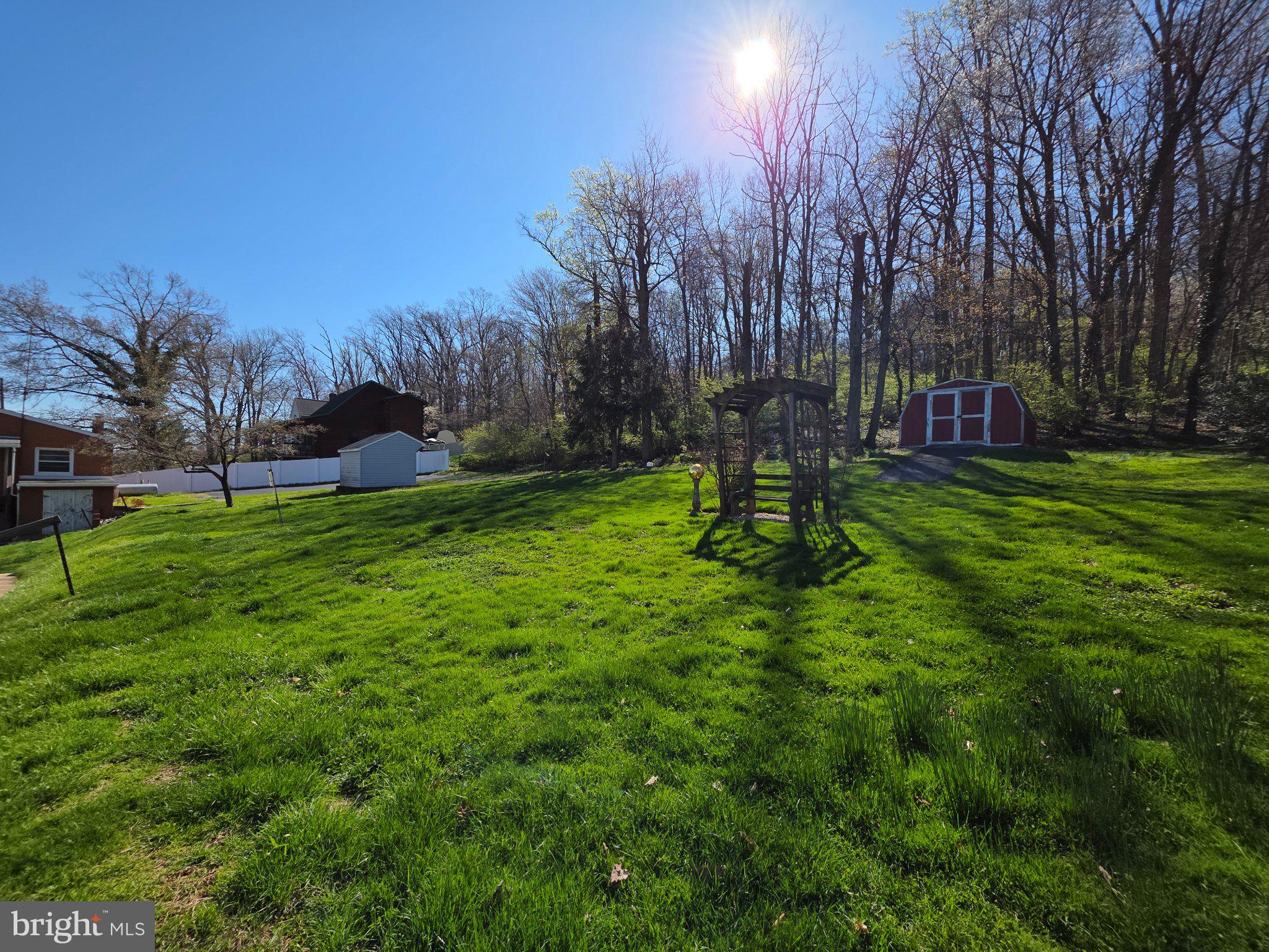 485 North Maple Street Ephrata, PA 17522 - Photo 9 of 23 Serene green oasis under bright skies.