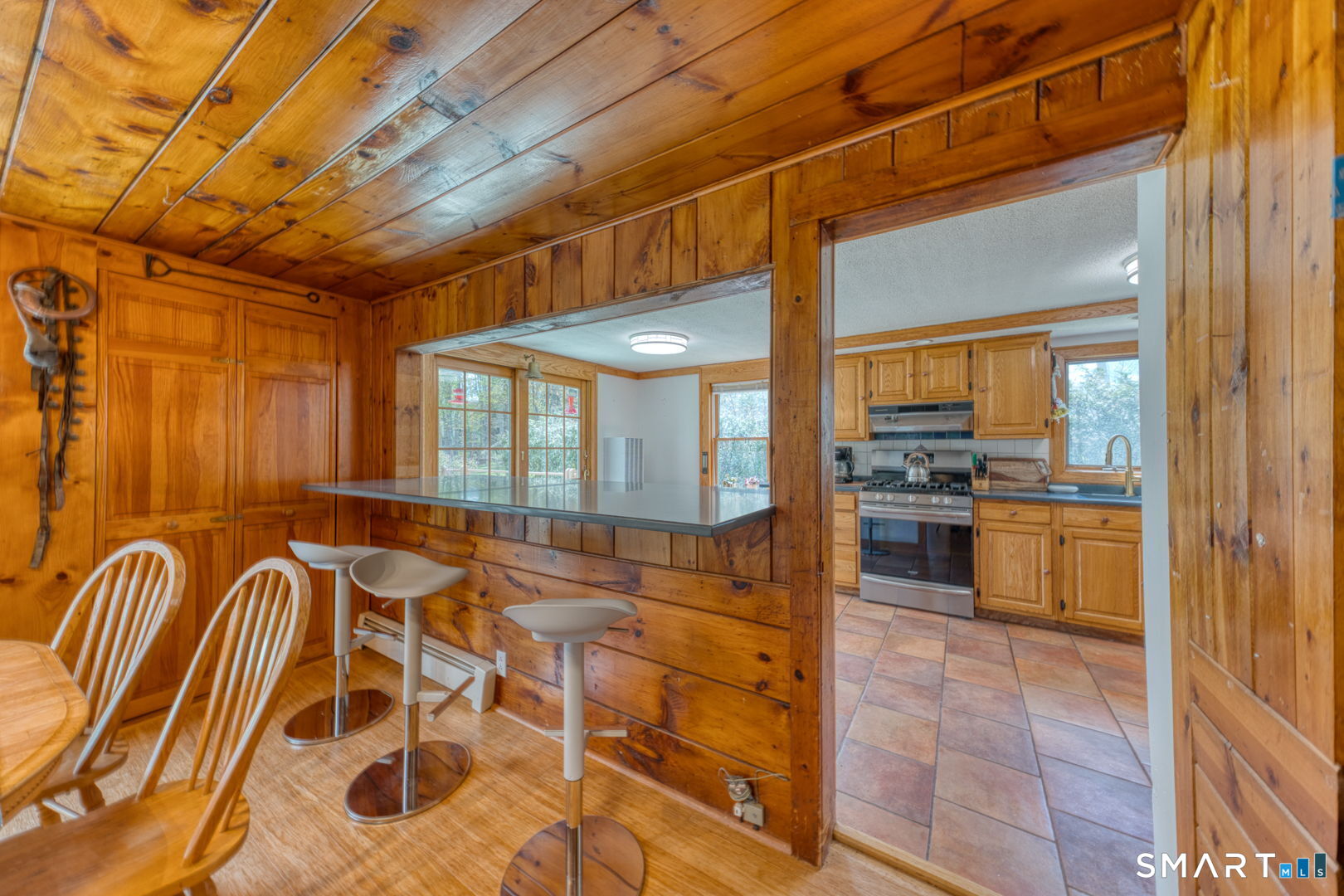 56 Tyler Lake Heights Road Goshen, CT 06756 - Photo 12 of 24 a view of a kitchen with a sink and cabinets