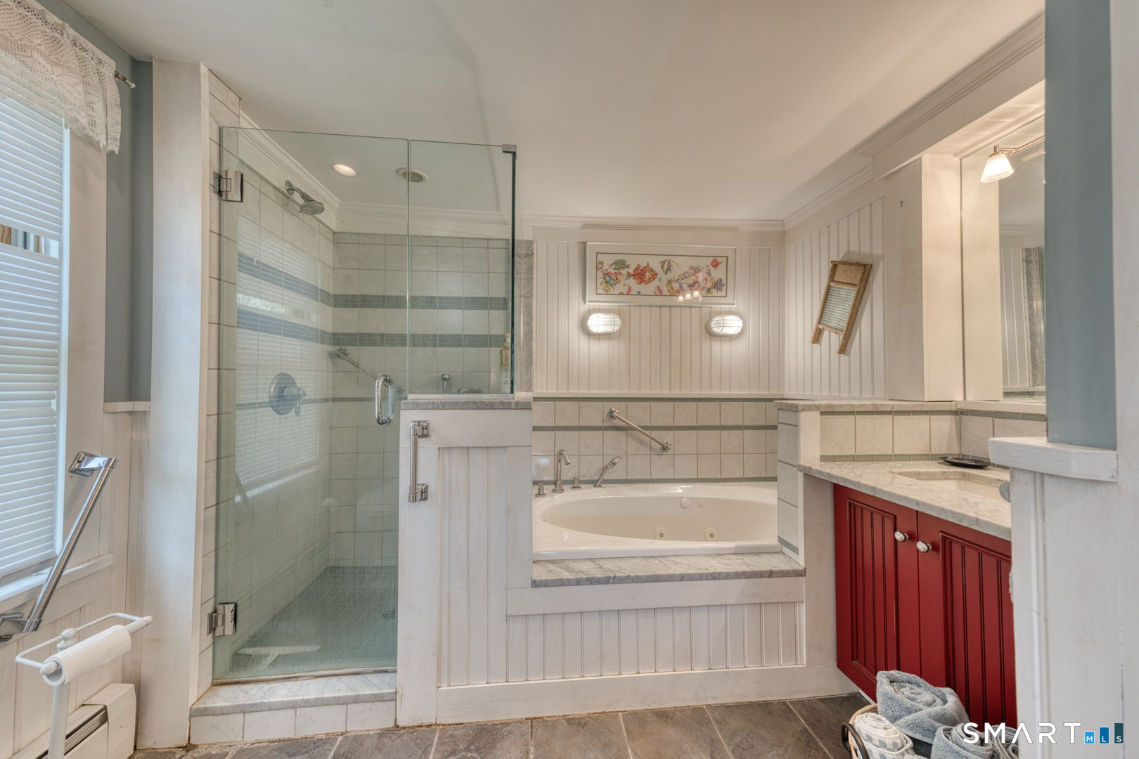 56 Tyler Lake Heights Road Goshen, CT 06756 - Photo 16 of 24 a bathroom with a bathtub and shower