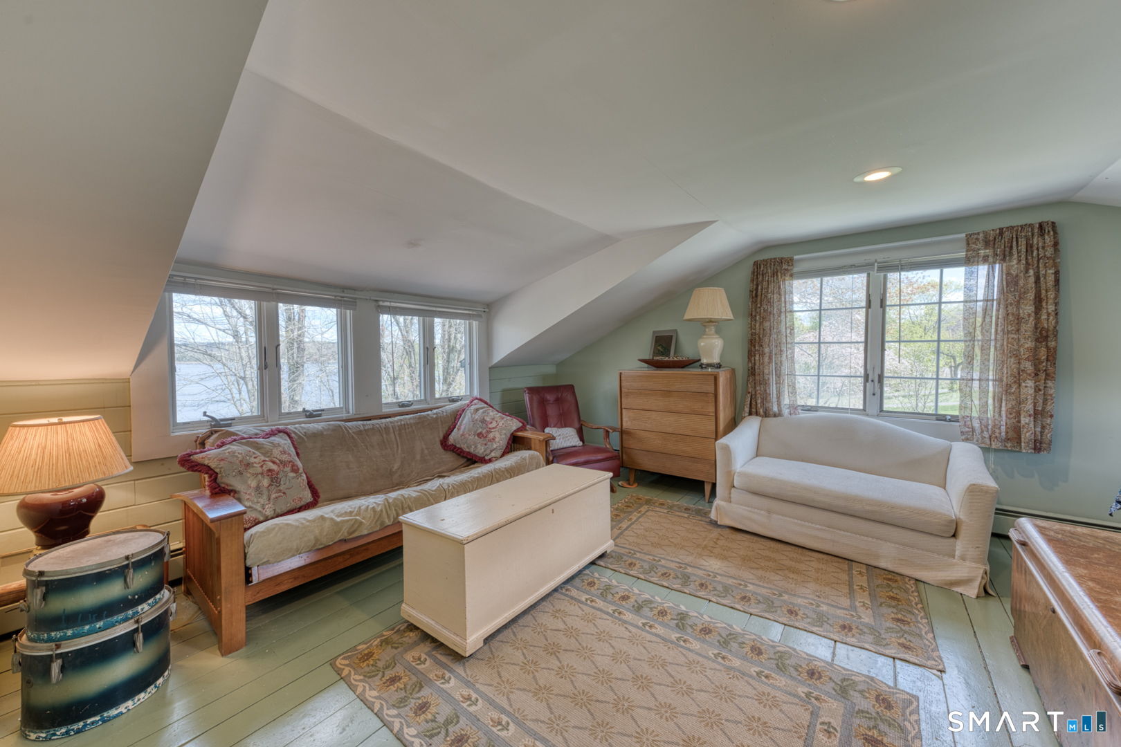 56 Tyler Lake Heights Road Goshen, CT 06756 - Photo 19 of 24 a living room with furniture and a large window