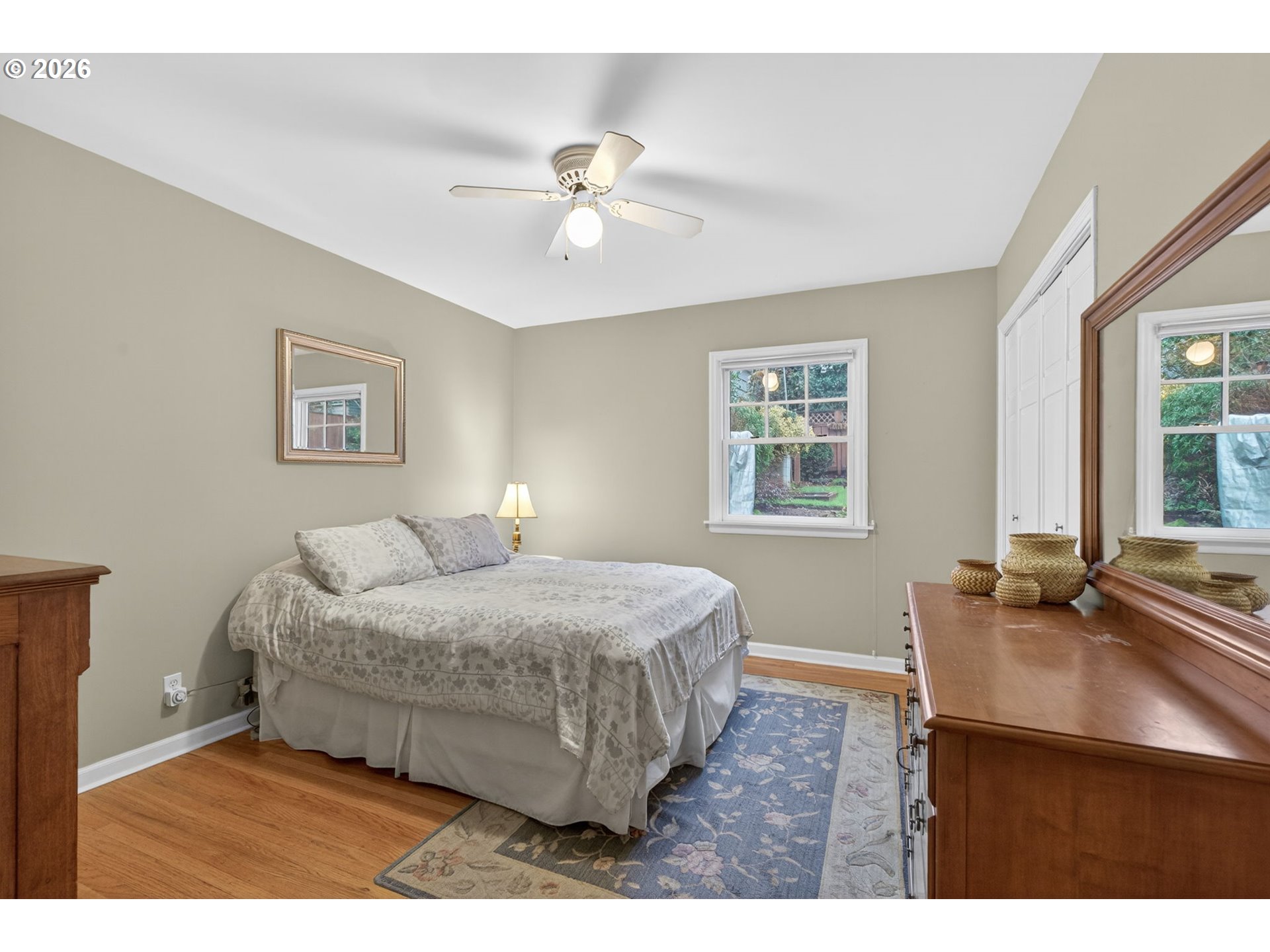 728 Northeast Royal Court Portland, OR 97232 - Photo 17 of 48 a bedroom with a bed and a table