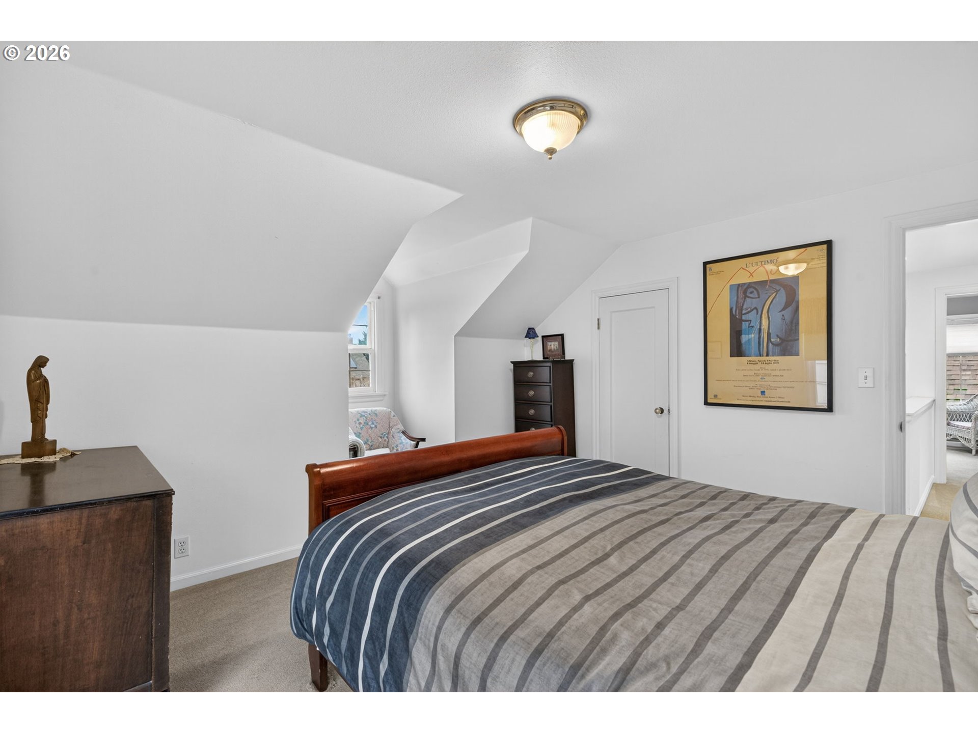 728 Northeast Royal Court Portland, OR 97232 - Photo 22 of 48 a bedroom with a bed and a cabinets