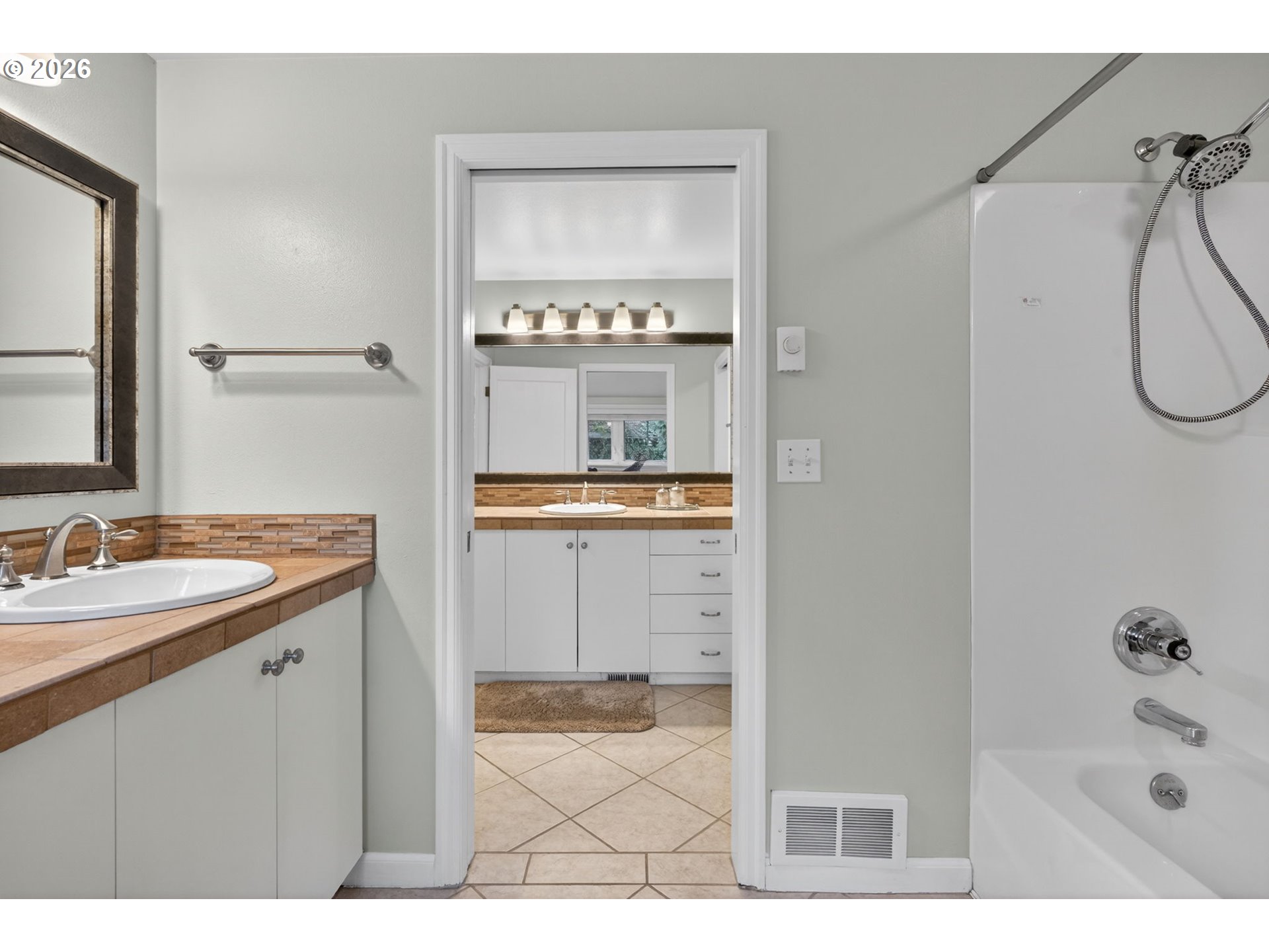 728 Northeast Royal Court Portland, OR 97232 - Photo 26 of 48 a bathroom with a sink and a mirror