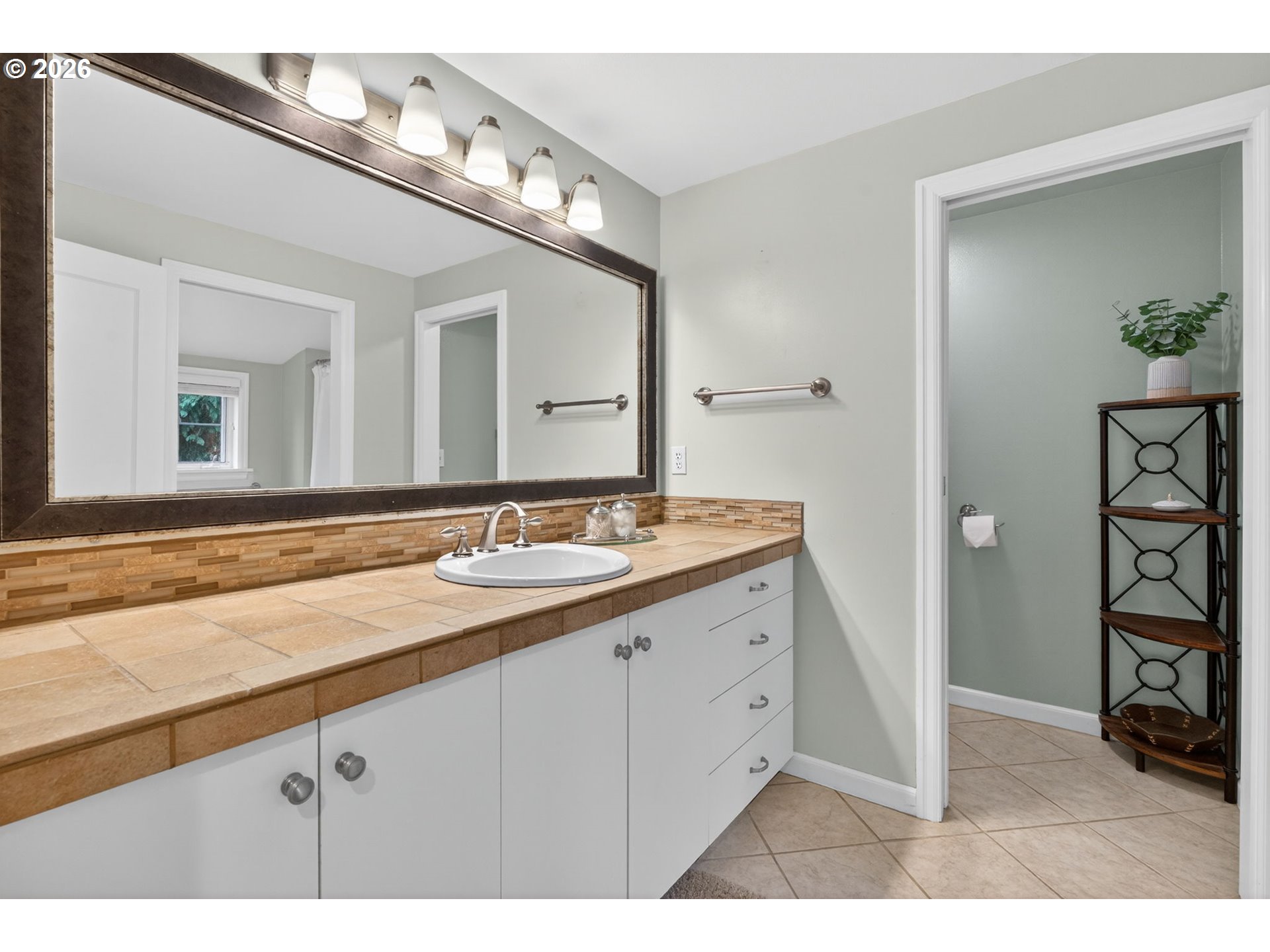 728 Northeast Royal Court Portland, OR 97232 - Photo 28 of 48 a bathroom with a sink and a mirror