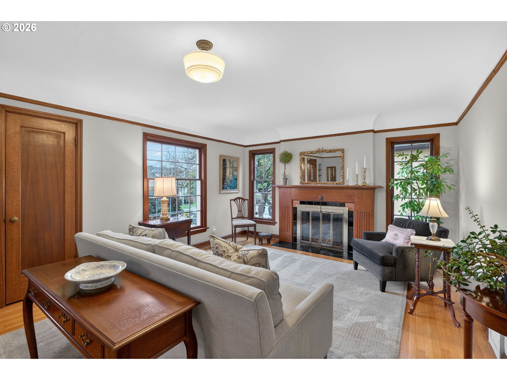 728 Northeast Royal Court Portland, OR 97232 - Photo 3 of 48 a living room with furniture and a fireplace