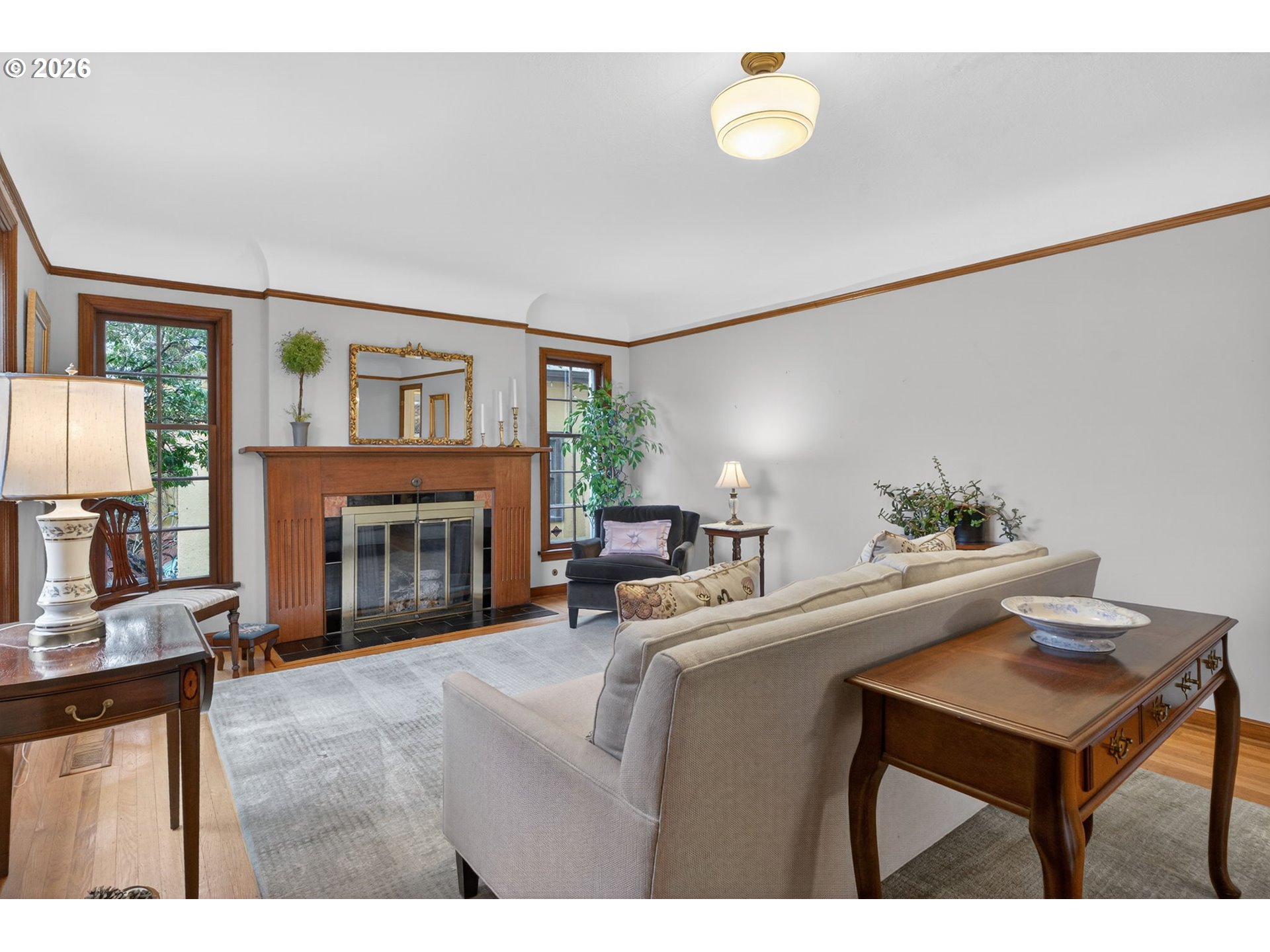 728 Northeast Royal Court Portland, OR 97232 - Photo 5 of 48 a living room with furniture and a fireplace
