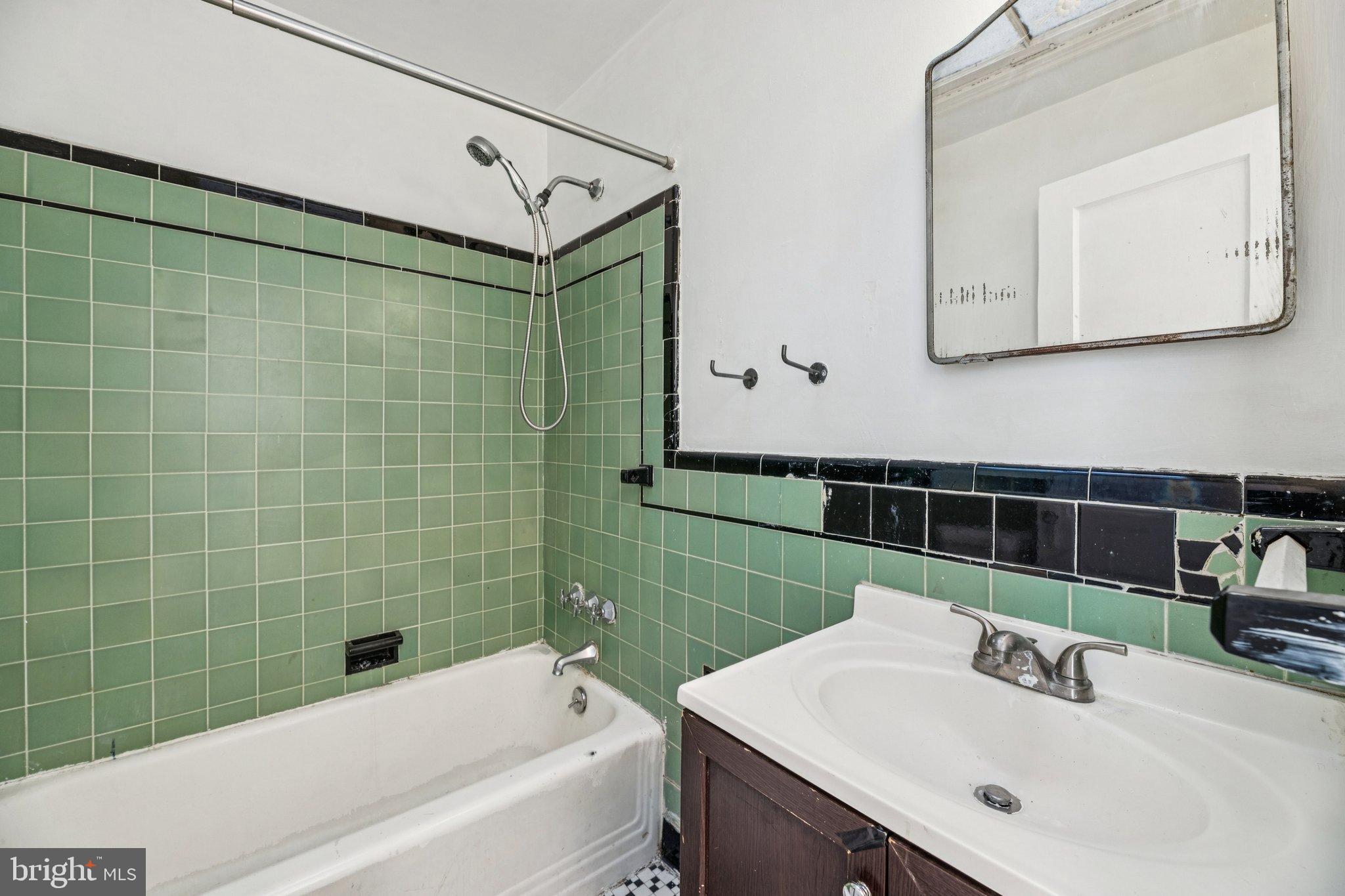 2521 Benning Road Northeast Washington, DC 20002 - Photo 15 of 22 Vintage charm in a classic bathroom setting.