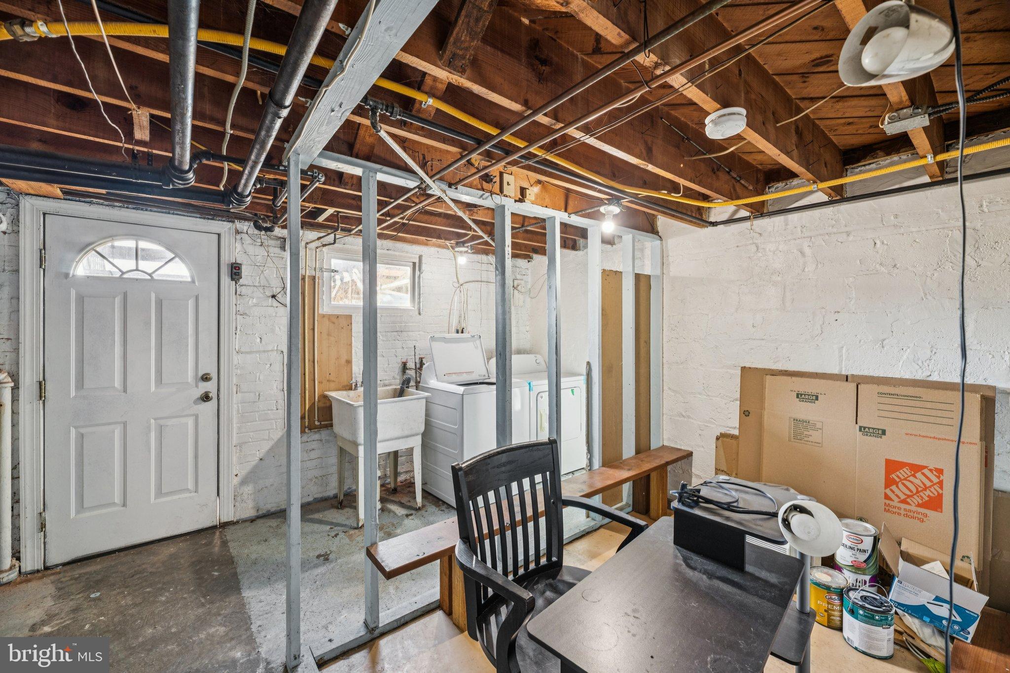 2521 Benning Road Northeast Washington, DC 20002 - Photo 20 of 22 Versatile basement with laundry and workspace.