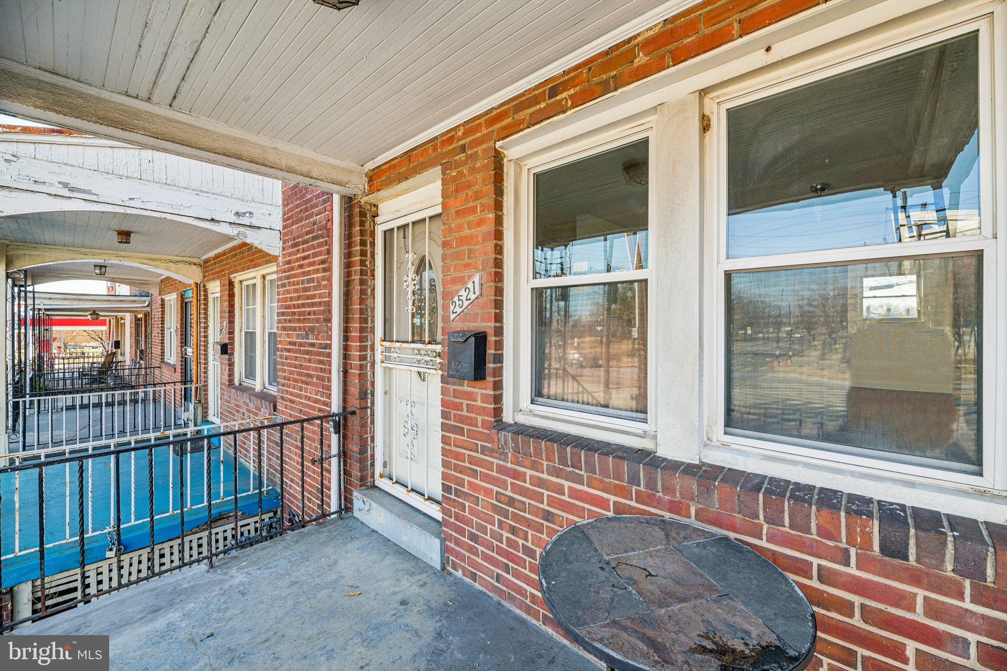 2521 Benning Road Northeast Washington, DC 20002 - Photo 21 of 22 Charming brick entryway with inviting porch.