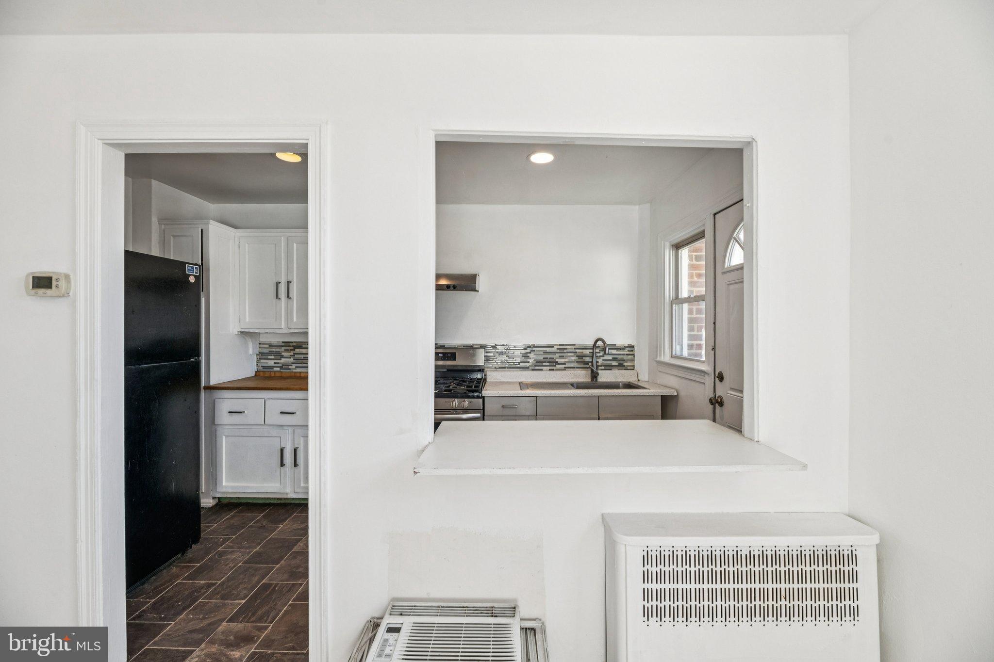 2521 Benning Road Northeast Washington, DC 20002 - Photo 8 of 22 Bright and airy kitchen with modern finishes.