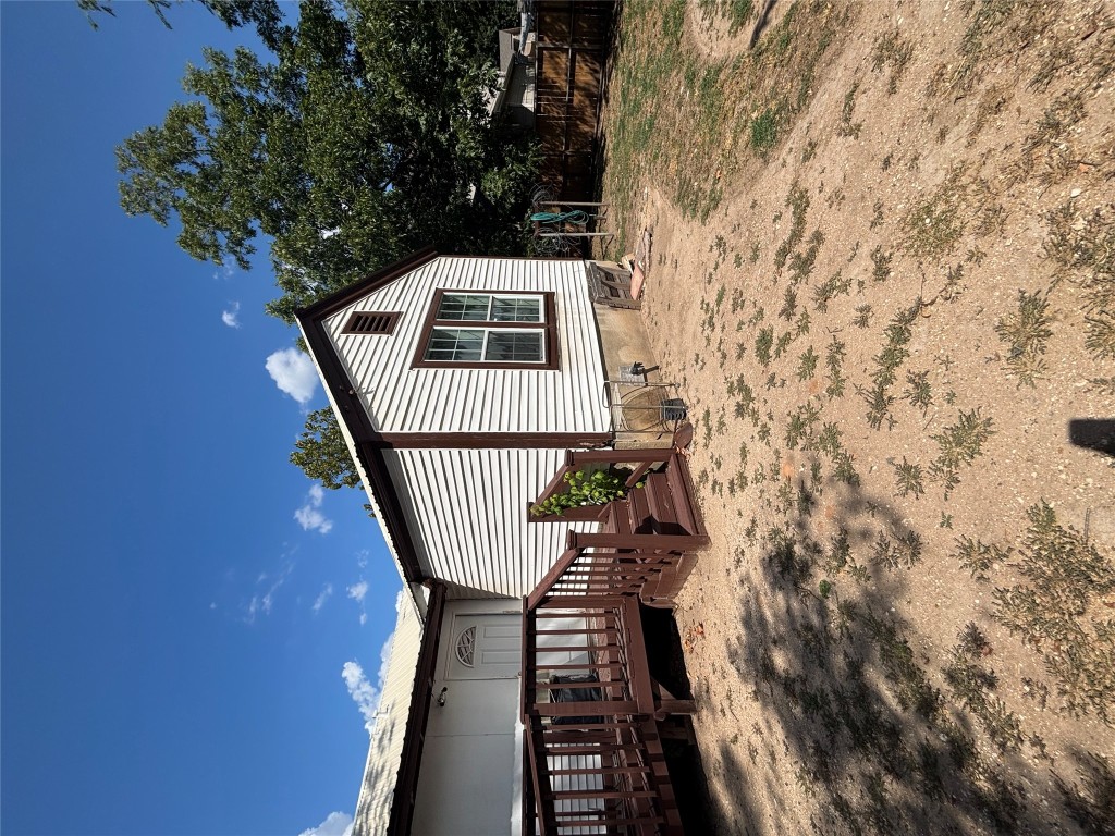 4605 Glissman Road Austin, TX 78702 - Photo 2 of 3 a view of a house with a yard