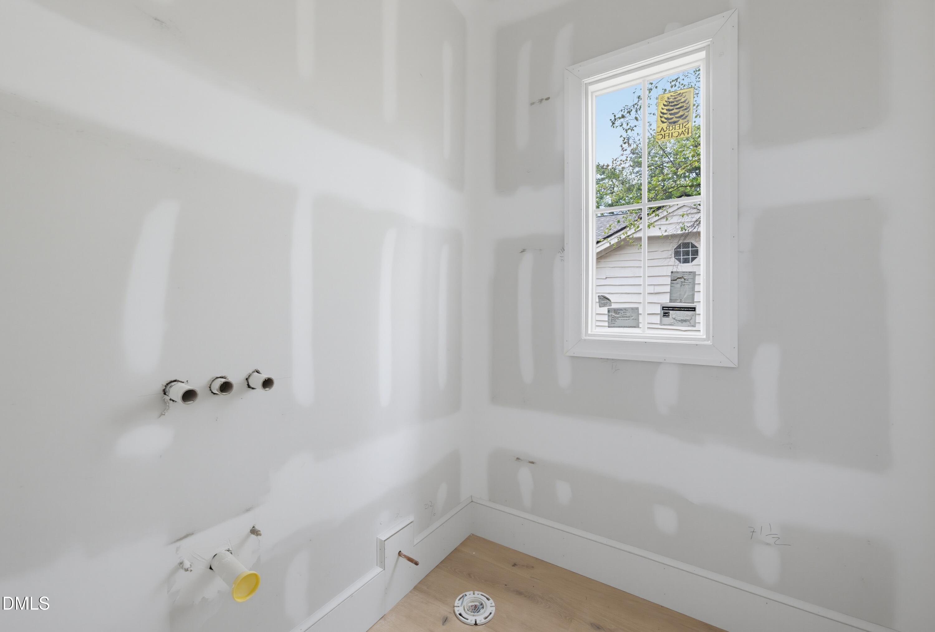 7508 Grist Mill Road Raleigh, NC 27615 - Photo 24 of 32 a bathroom with a bathtub