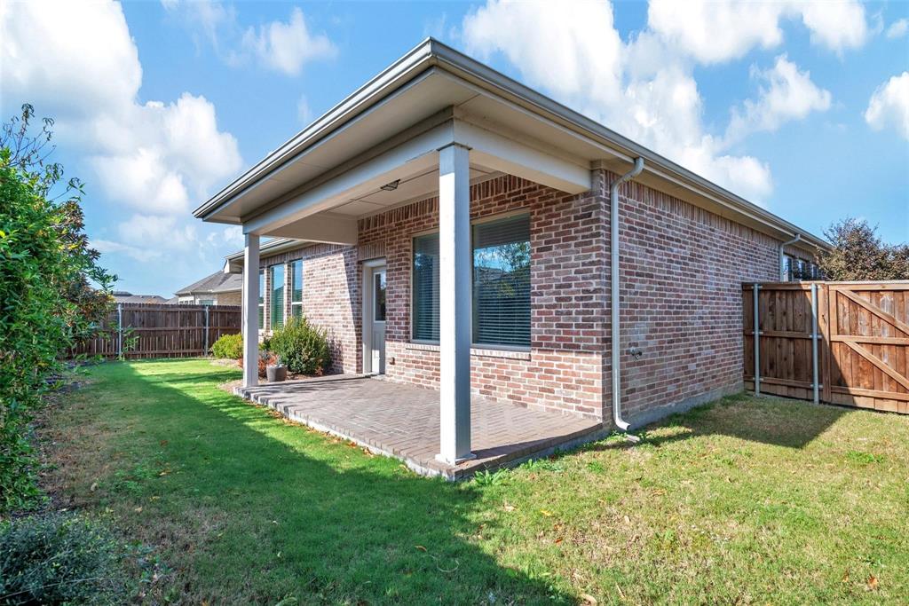1605 Cedar Crest Drive Forney, TX 75126 - Photo 19 of 26 a view of a house with backyard