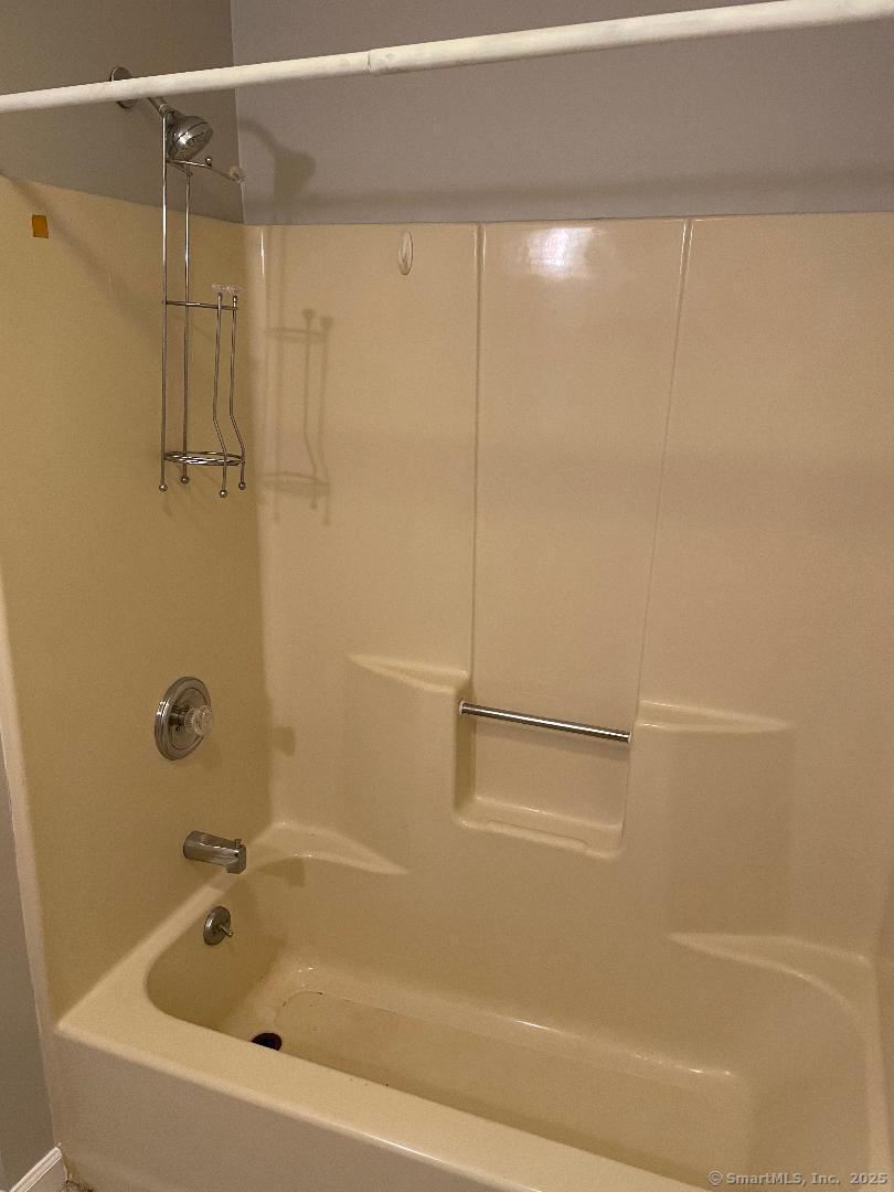 155 Unit 2 Bristol Street Thompson, CT 06277 - Photo 10 of 18 a bathroom with a shower and a shower