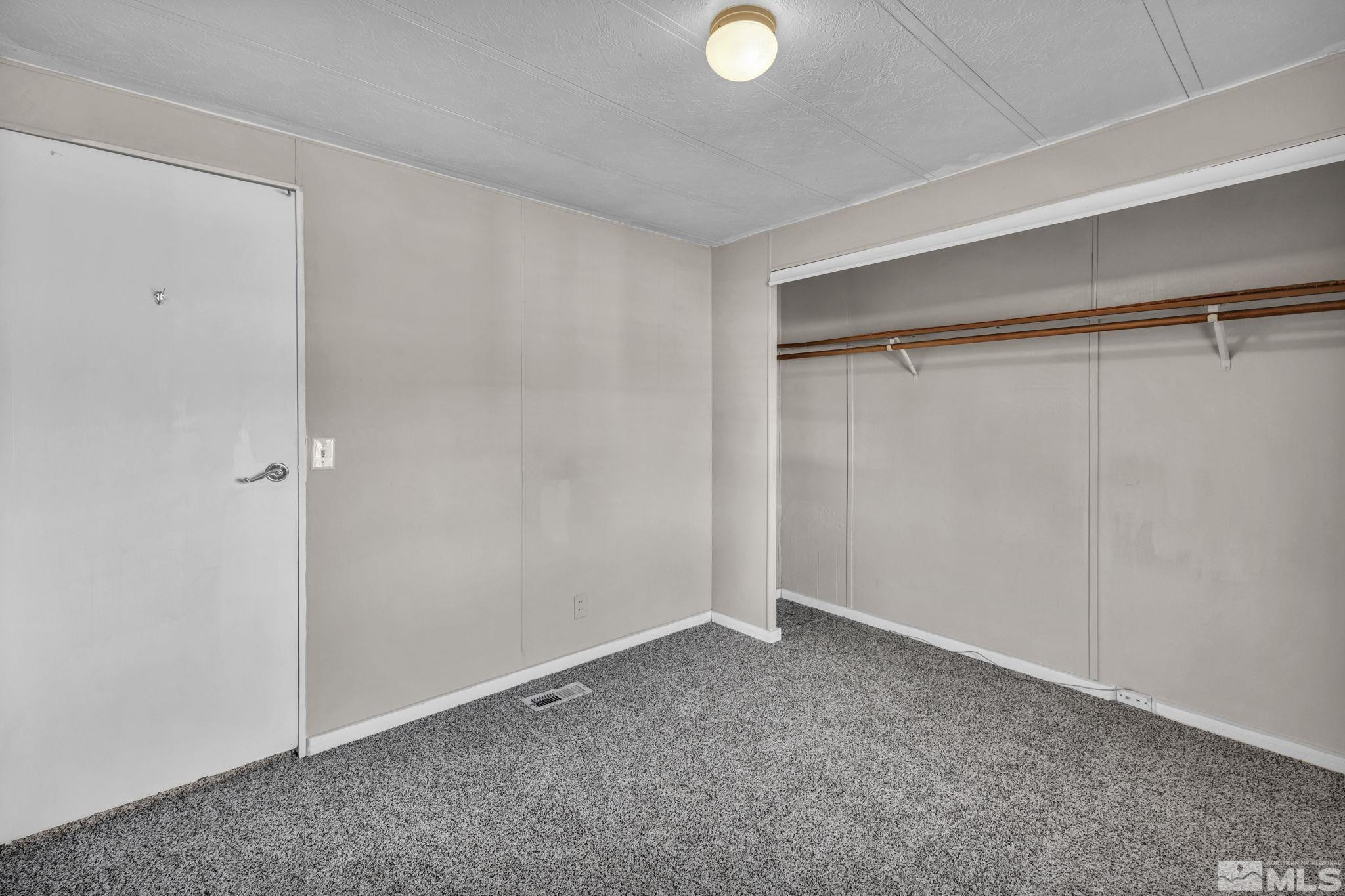 4770 Rampion Way Sun Valley, NV 89433 - Photo 14 of 17 a view of an empty room