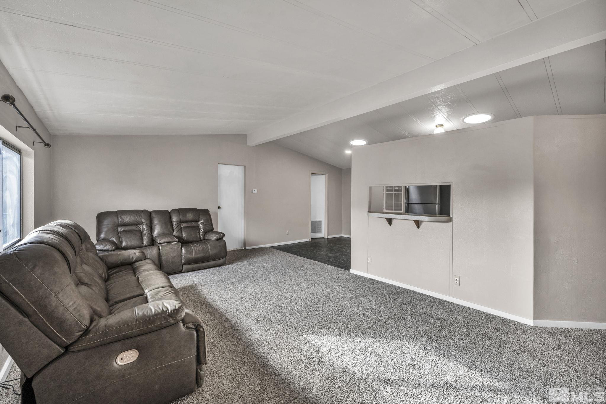 4770 Rampion Way Sun Valley, NV 89433 - Photo 3 of 17 a living room with furniture