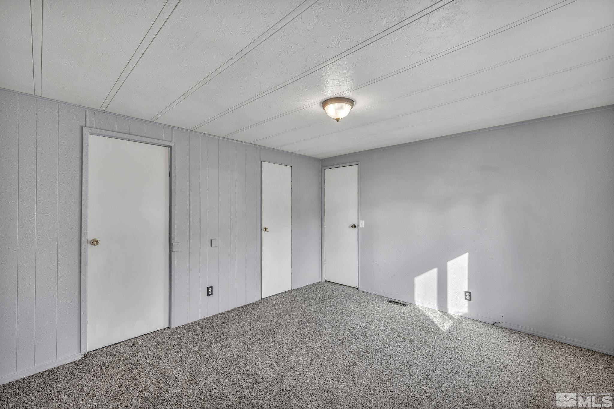 4770 Rampion Way Sun Valley, NV 89433 - Photo 10 of 17 a view of an empty room