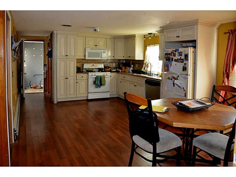 229 Mapleton Street Cranston, RI 02910 - Photo 5 of 9 Kitchen. New laminate, cabinets, recessed lighting in kitchen. New windows throughout.