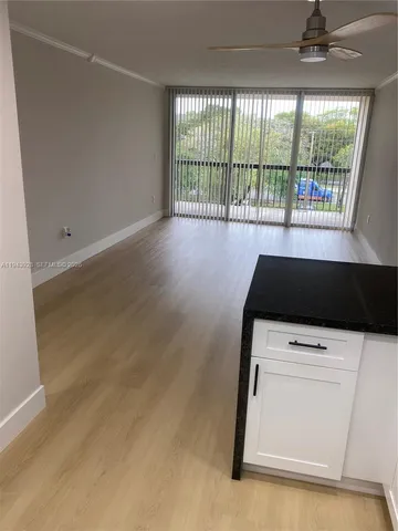 a kitchen with a stove and a microwave