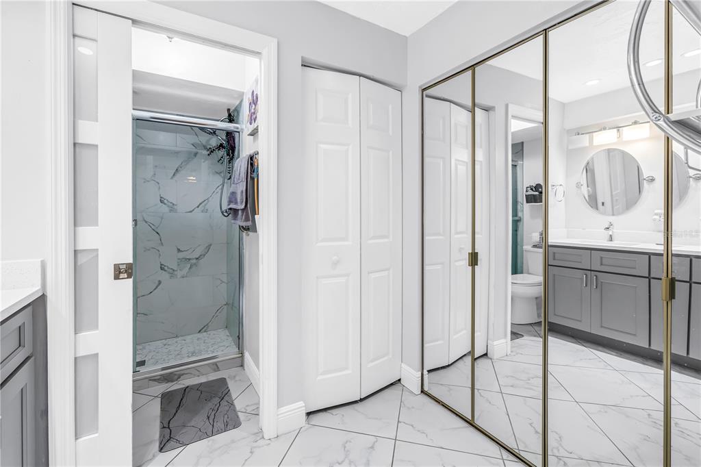 415 Spring Lakes Boulevard, Unit 415D Bradenton, FL 34210 - Photo 21 of 52 a bathroom with a shower and a sink