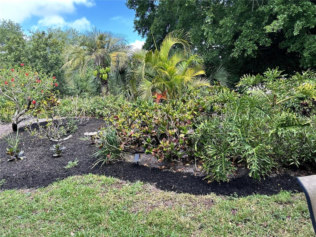 415 Spring Lakes Boulevard, Unit 415D Bradenton, FL 34210 - Photo 37 of 52 a view of a garden