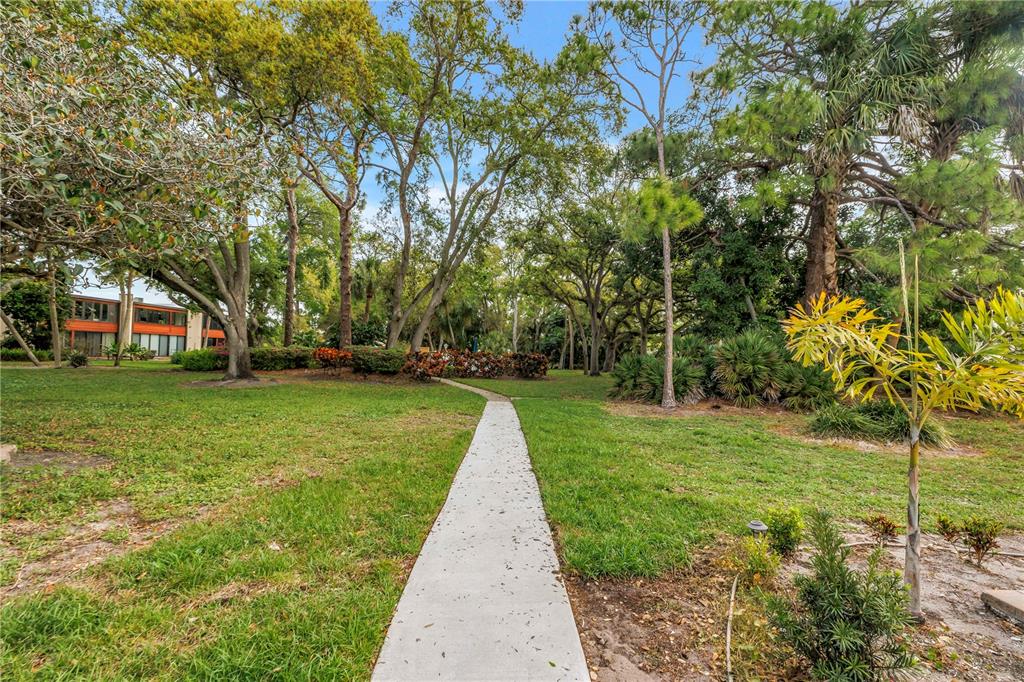 415 Spring Lakes Boulevard, Unit 415D Bradenton, FL 34210 - Photo 48 of 52 a view of house with garden