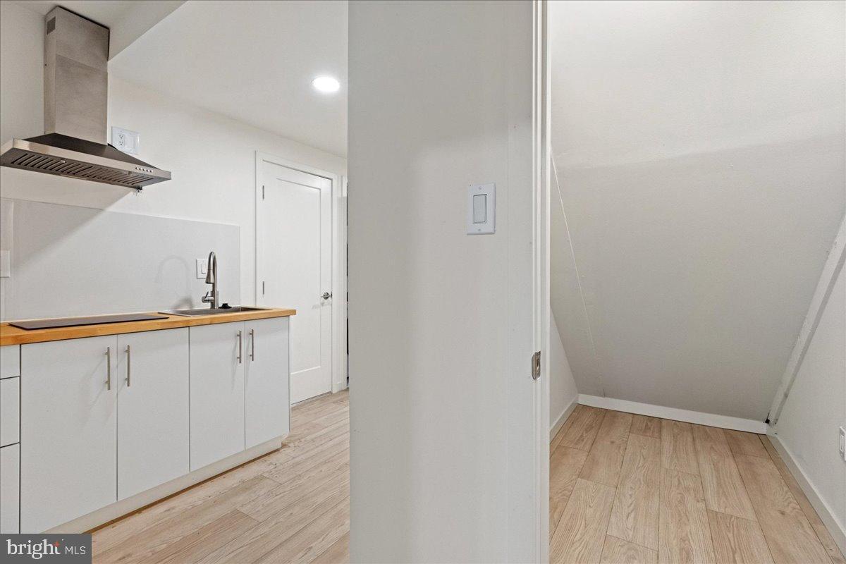 3907 Spring Garden Street, Unit 1 Philadelphia, PA 19104 - Photo 14 of 33 a view of an empty room with wooden floor