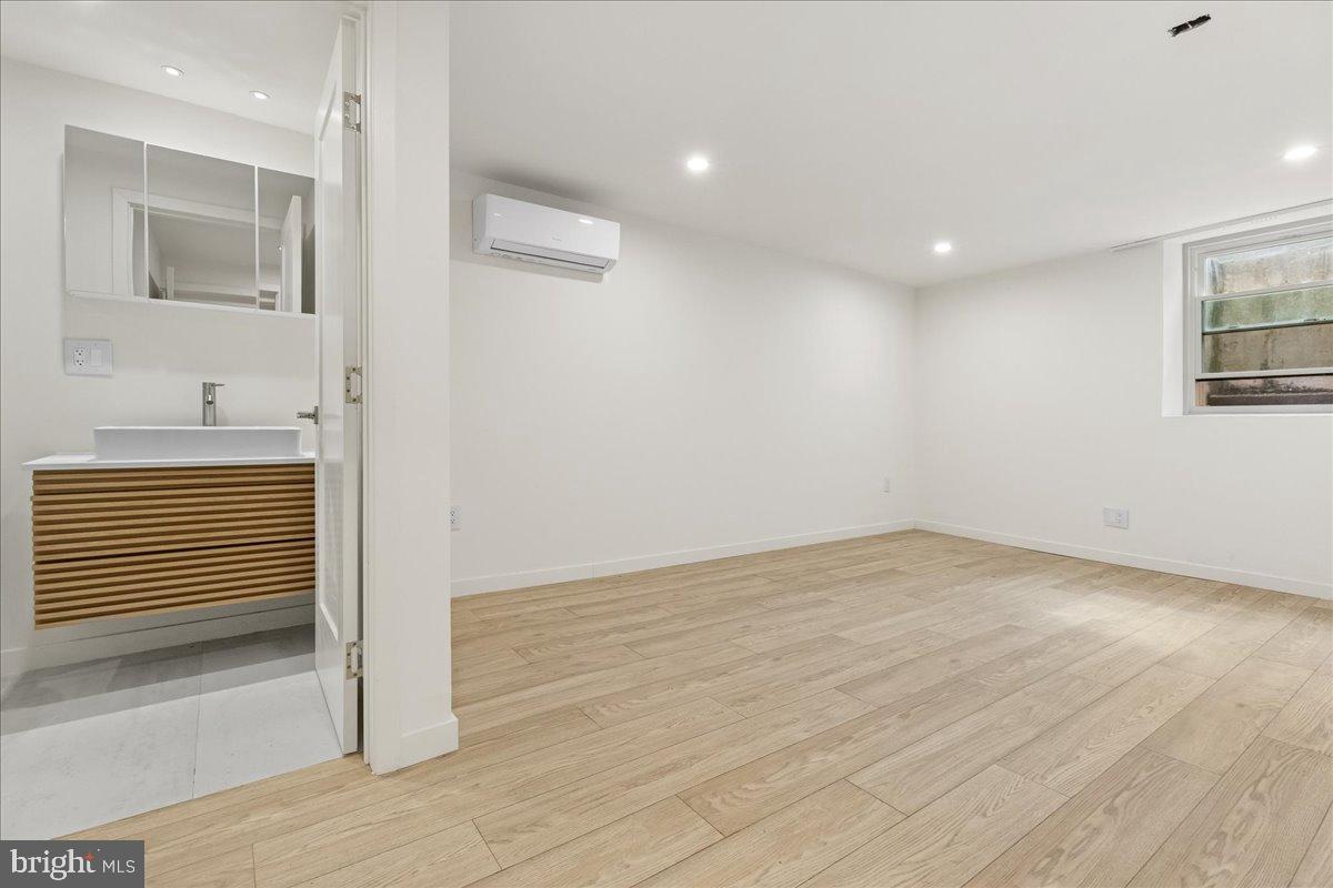 3907 Spring Garden Street, Unit 1 Philadelphia, PA 19104 - Photo 15 of 33 a view of empty room with wooden floor