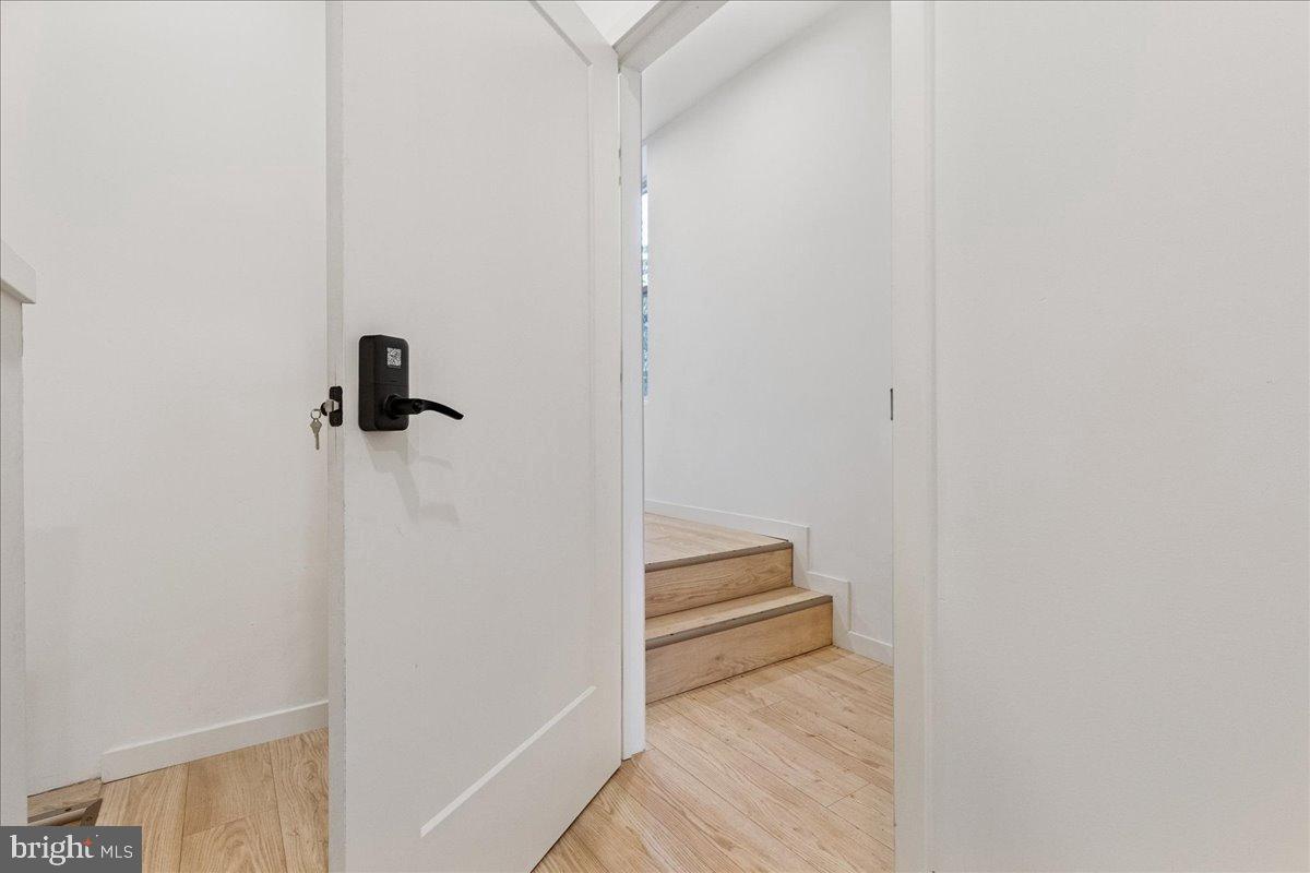 3907 Spring Garden Street, Unit 1 Philadelphia, PA 19104 - Photo 20 of 33 a view of room with racks on the wall