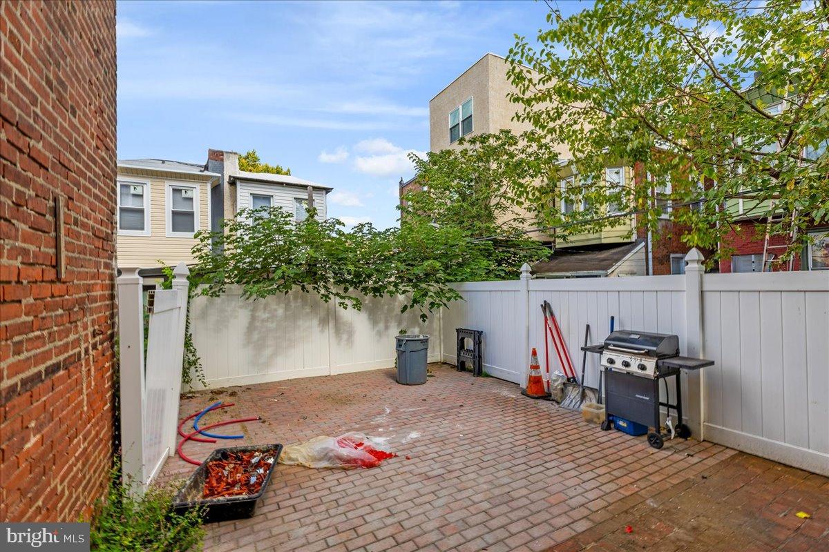 3907 Spring Garden Street, Unit 1 Philadelphia, PA 19104 - Photo 33 of 33 a view of a chair and table in the patio