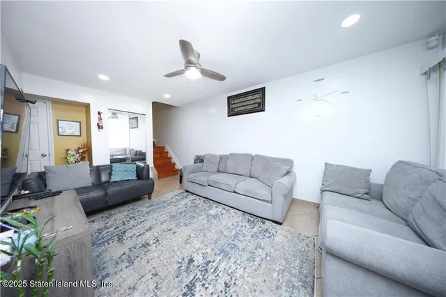 a living room with furniture and a couch