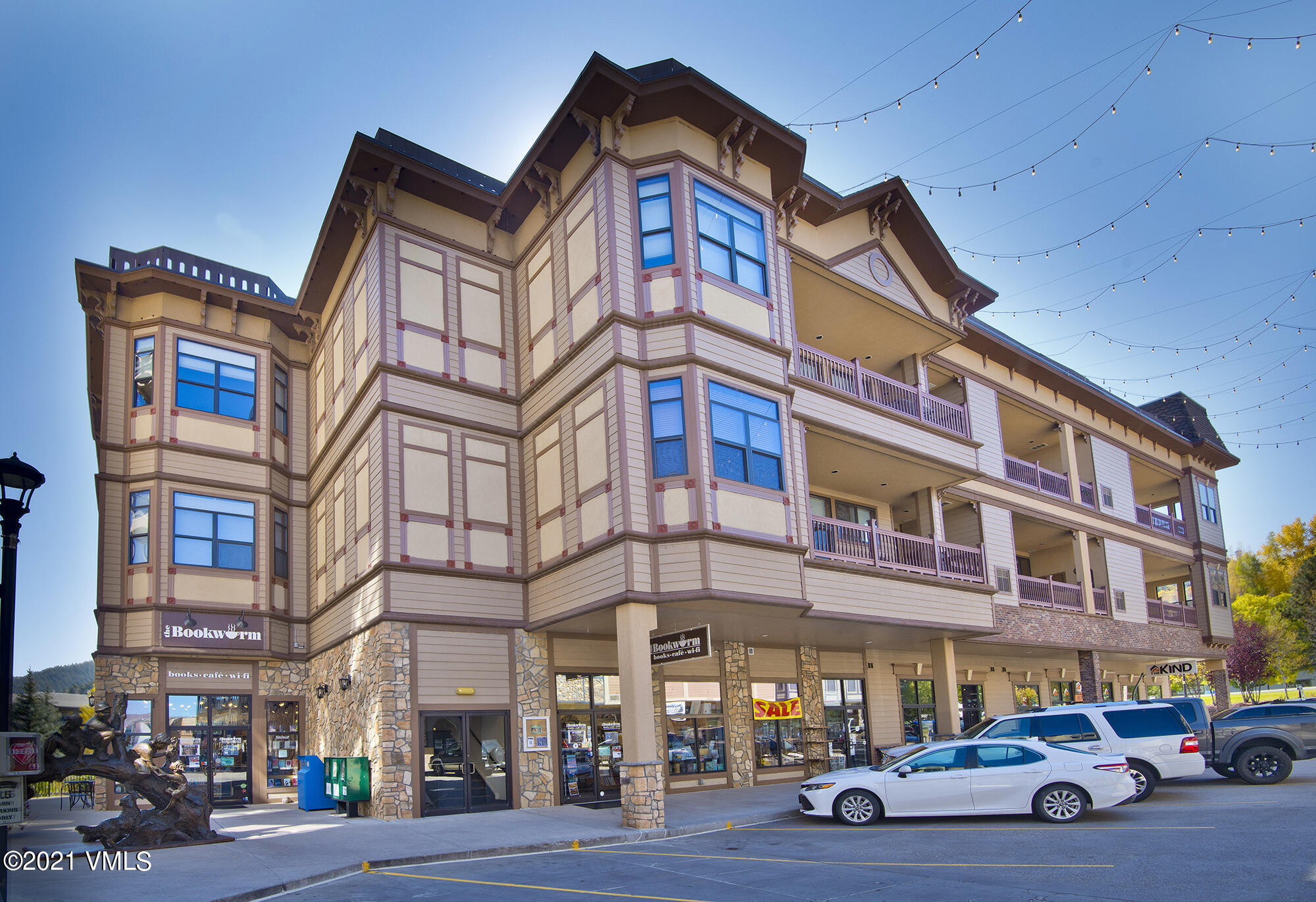 a front view of a building with street view
