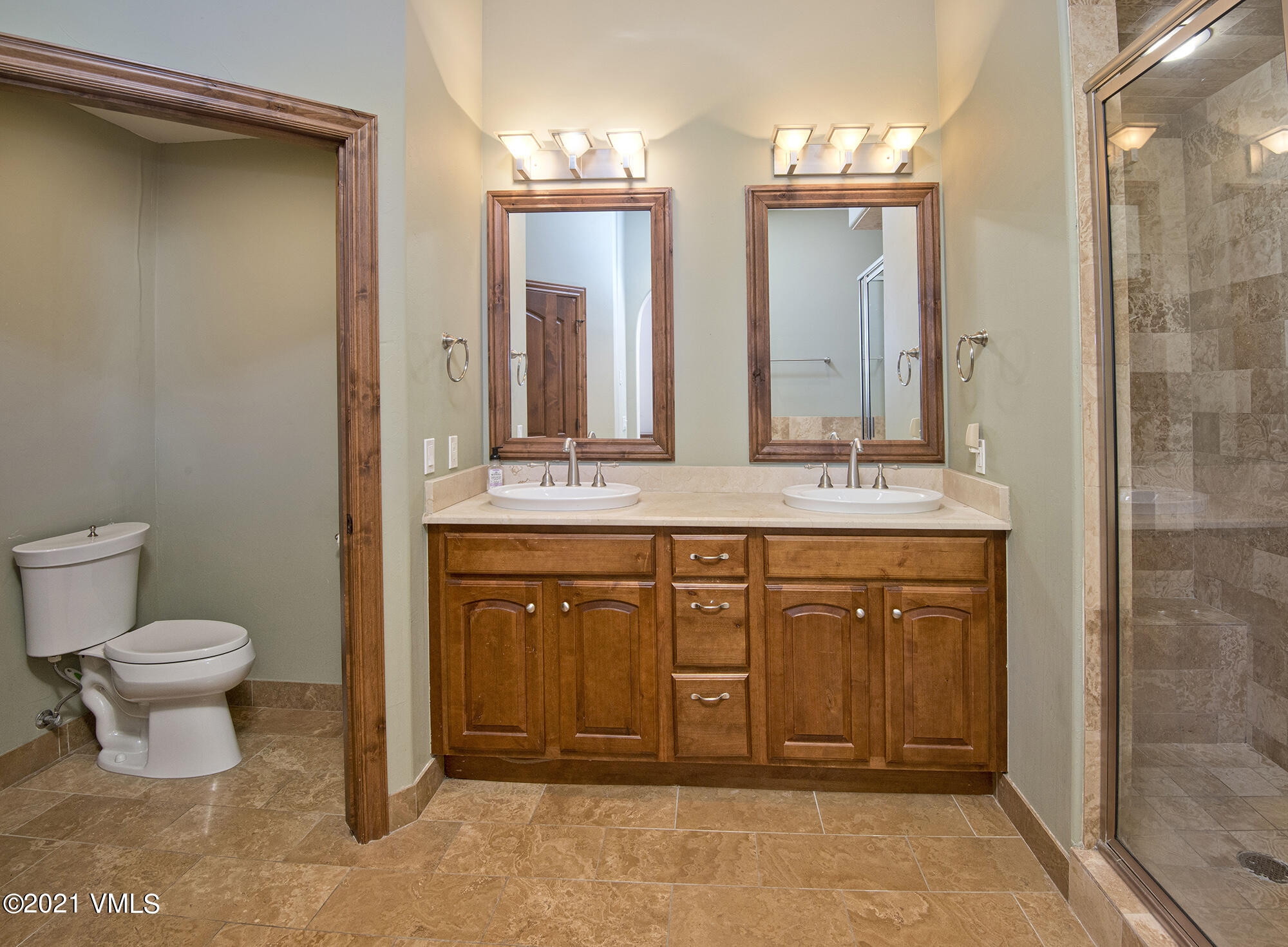 295 Main Street, Unit R201 Edwards, CO 81632 - Photo 15 of 36 a bathroom with a sink and a toilet