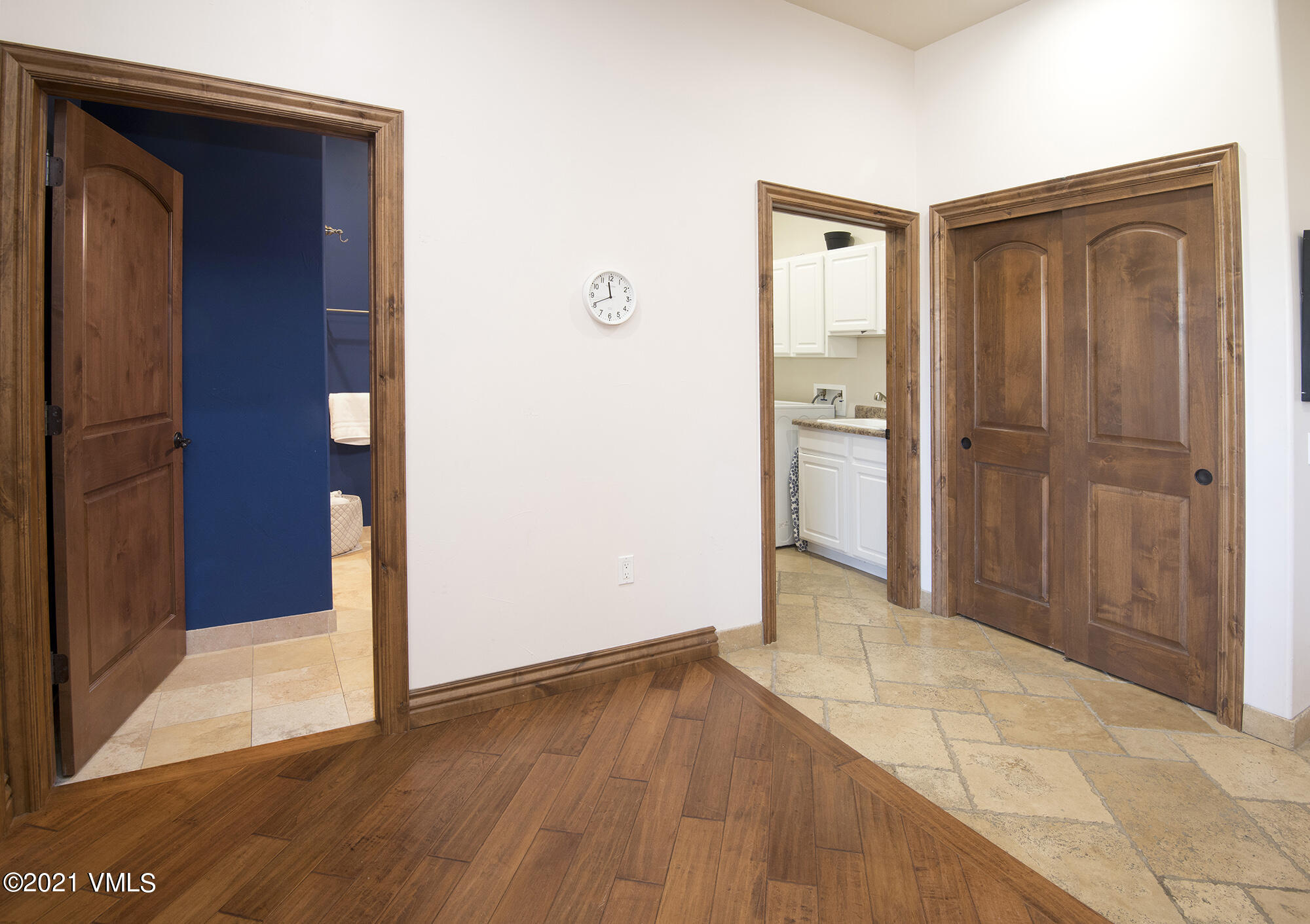 295 Main Street, Unit R201 Edwards, CO 81632 - Photo 17 of 36 a view of an empty room with wooden door